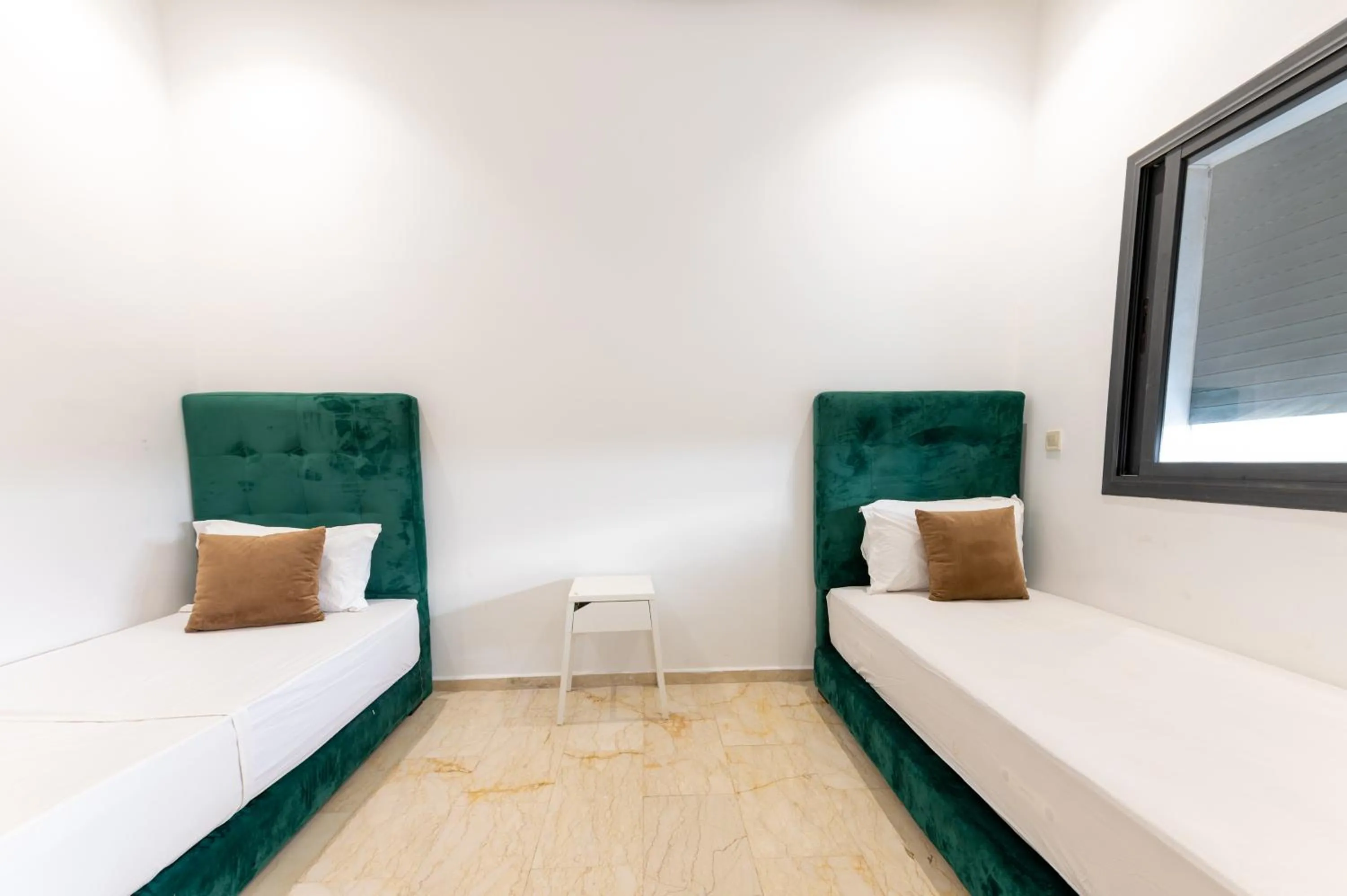 Bed in Garden Bay Appart'Hôtel