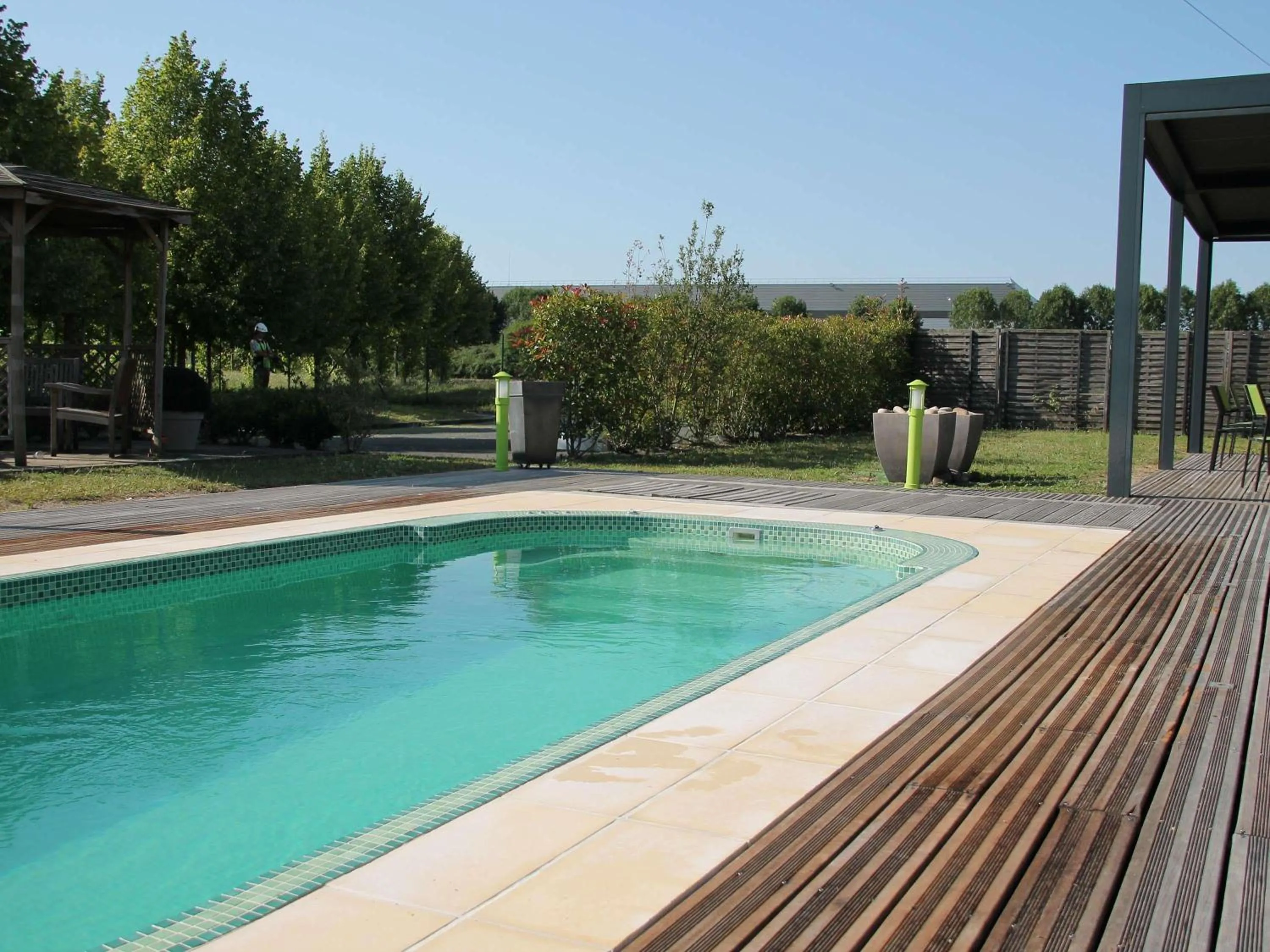 Pool view in Hôtel ibis Styles Montargis Arboria