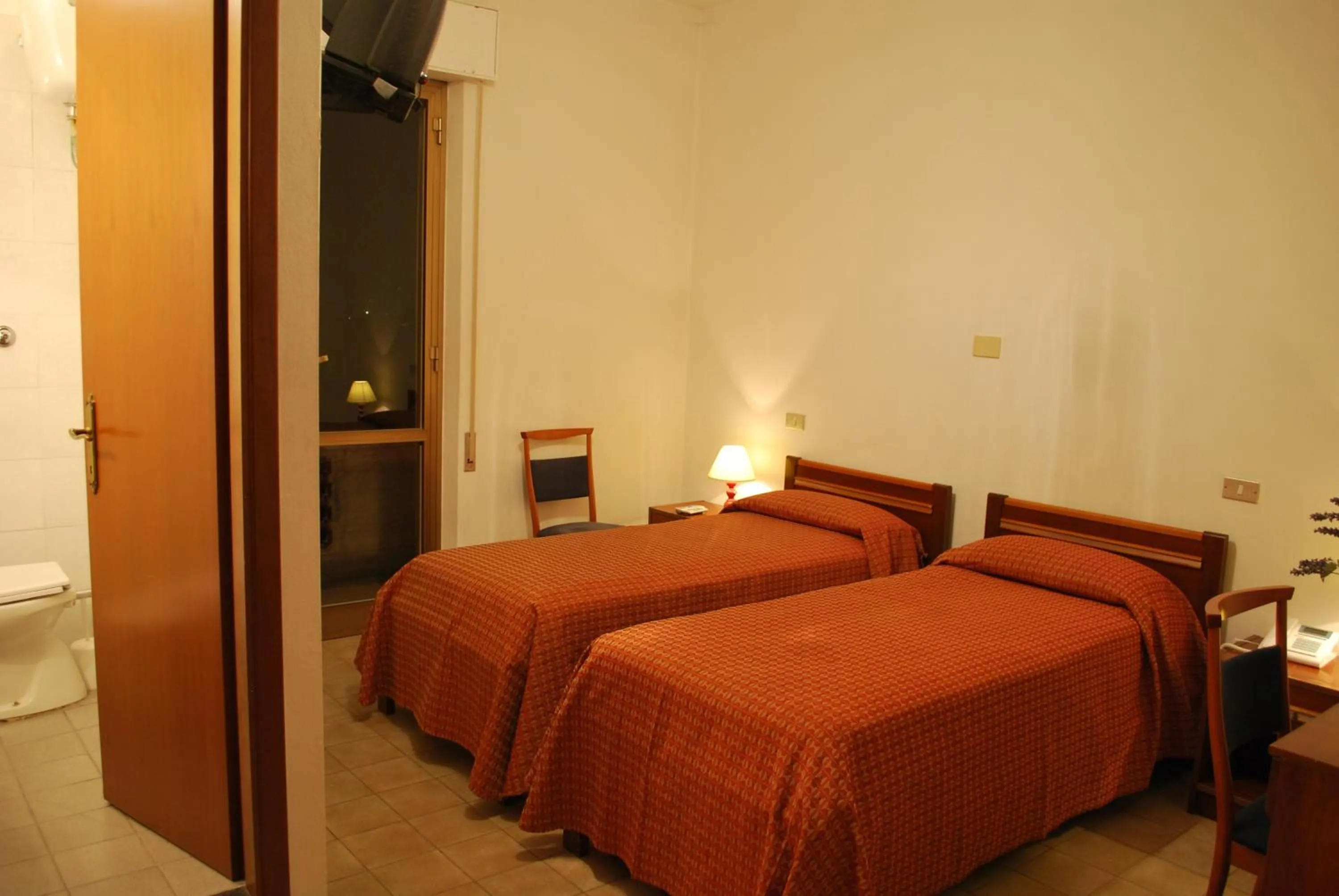 Bed in Albergo Smeraldo