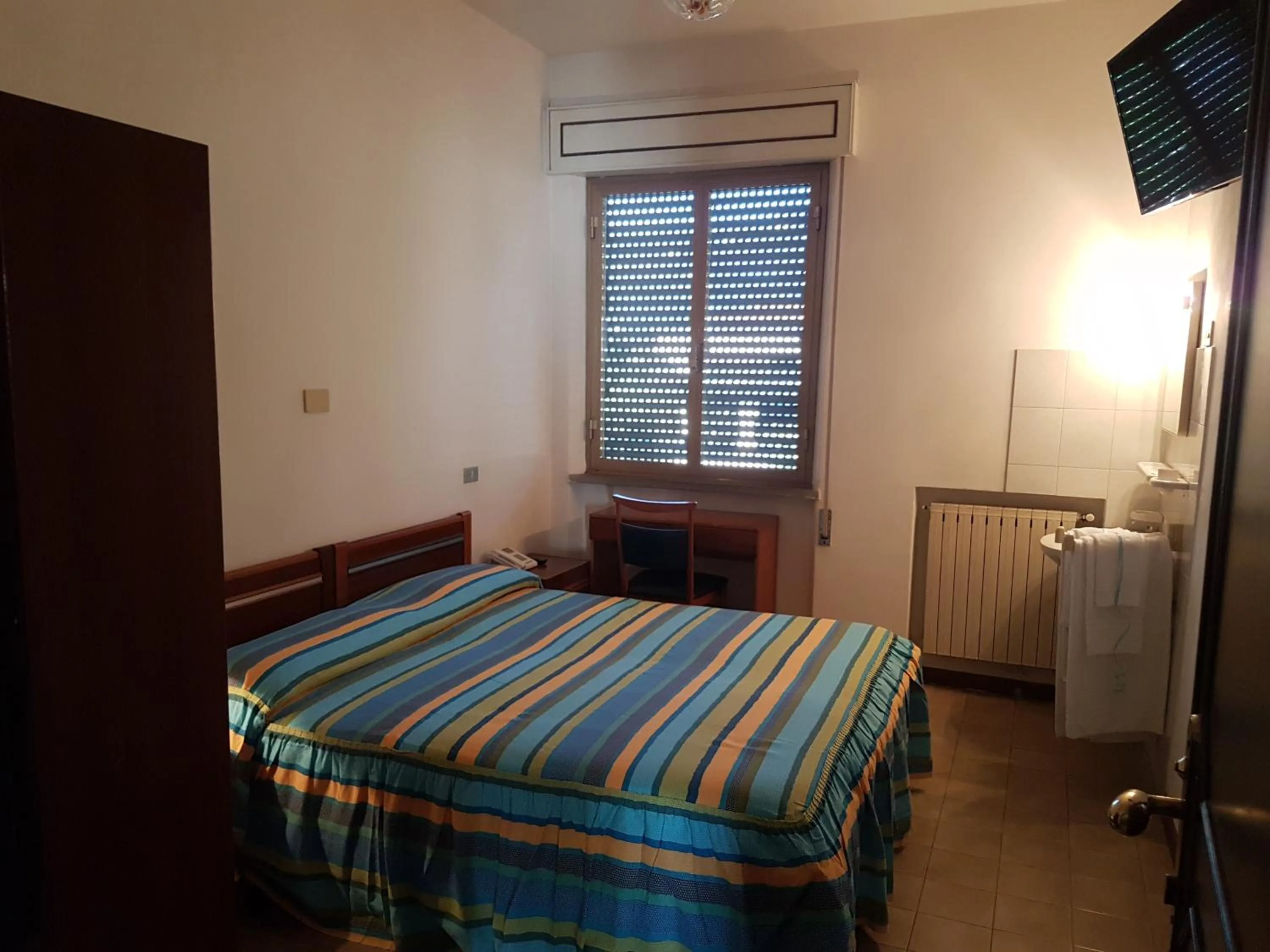 Bed in Albergo Smeraldo