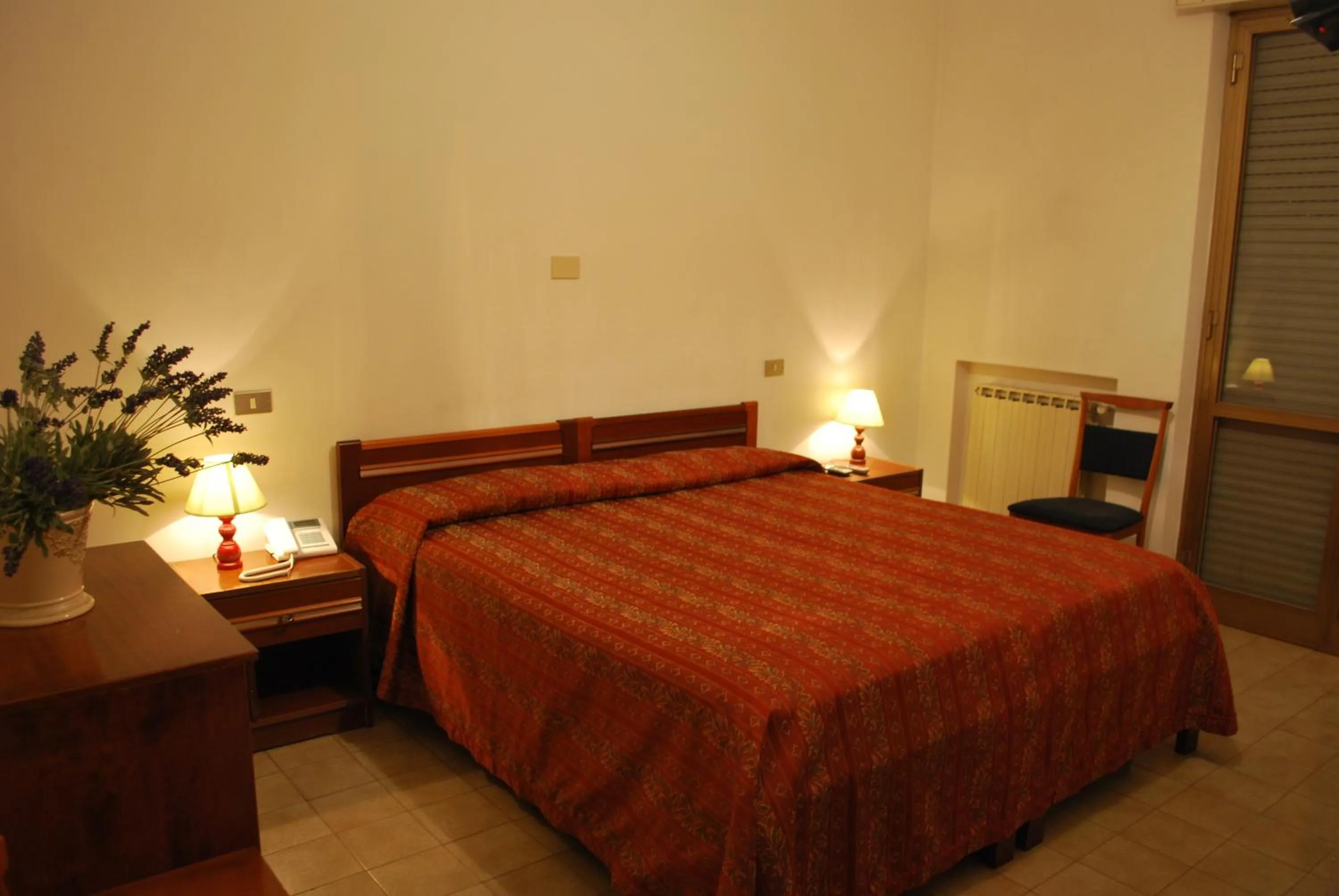 Bed in Albergo Smeraldo