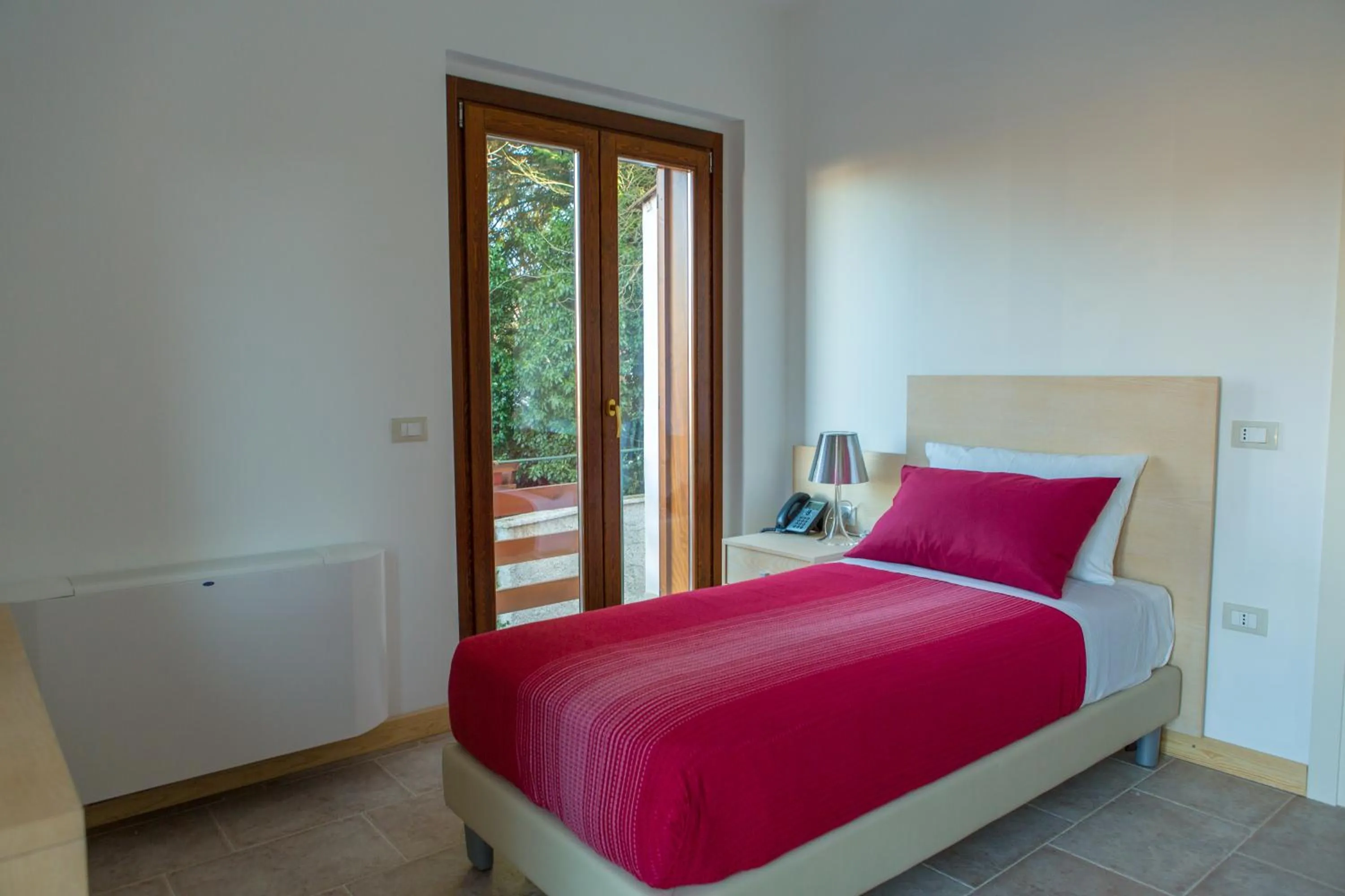 Photo of the whole room in Il Moscardino Country Resort