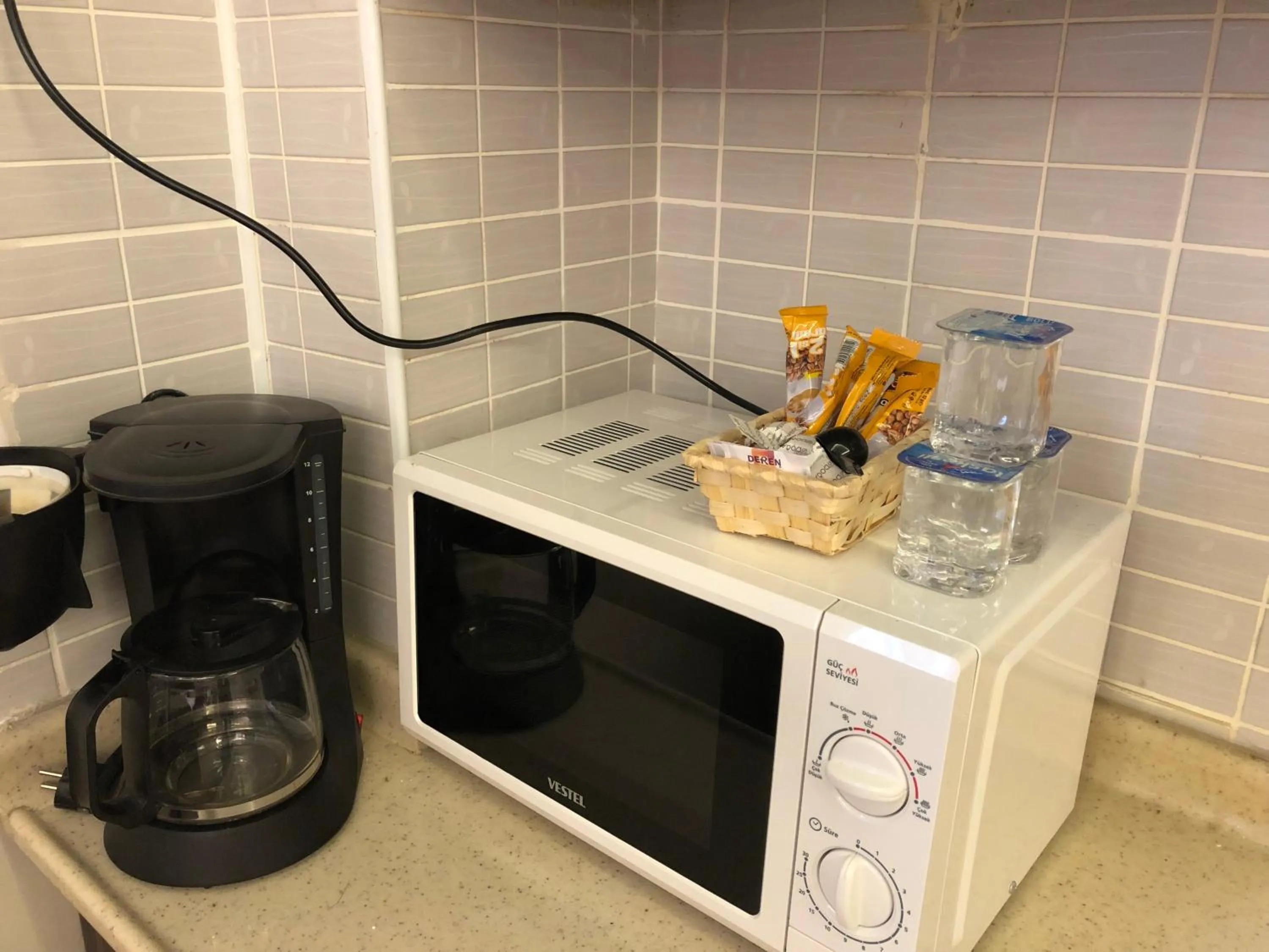 Kitchen or kitchenette in Capricorn by Otantik Suites