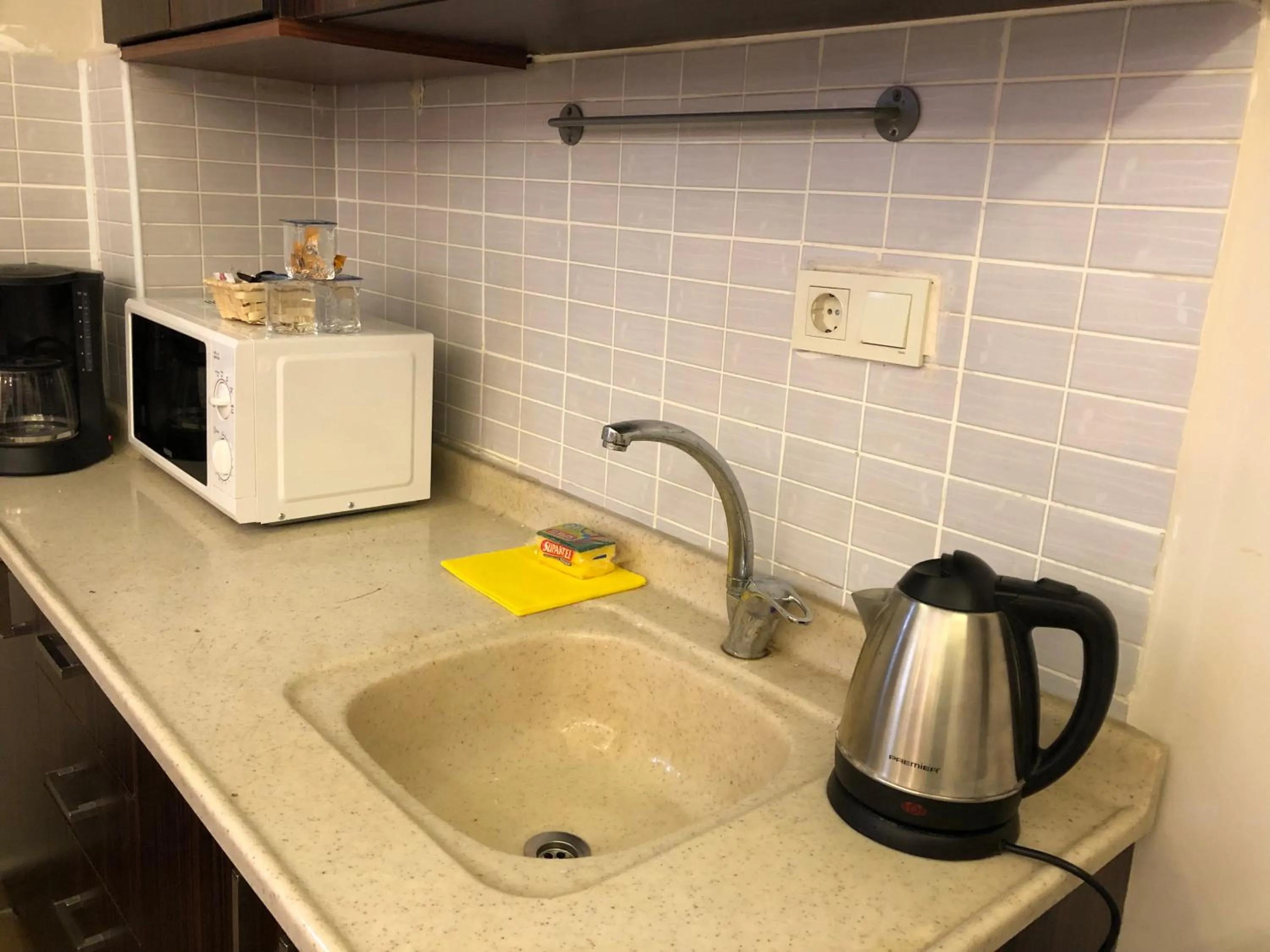 Kitchen or kitchenette in Capricorn by Otantik Suites