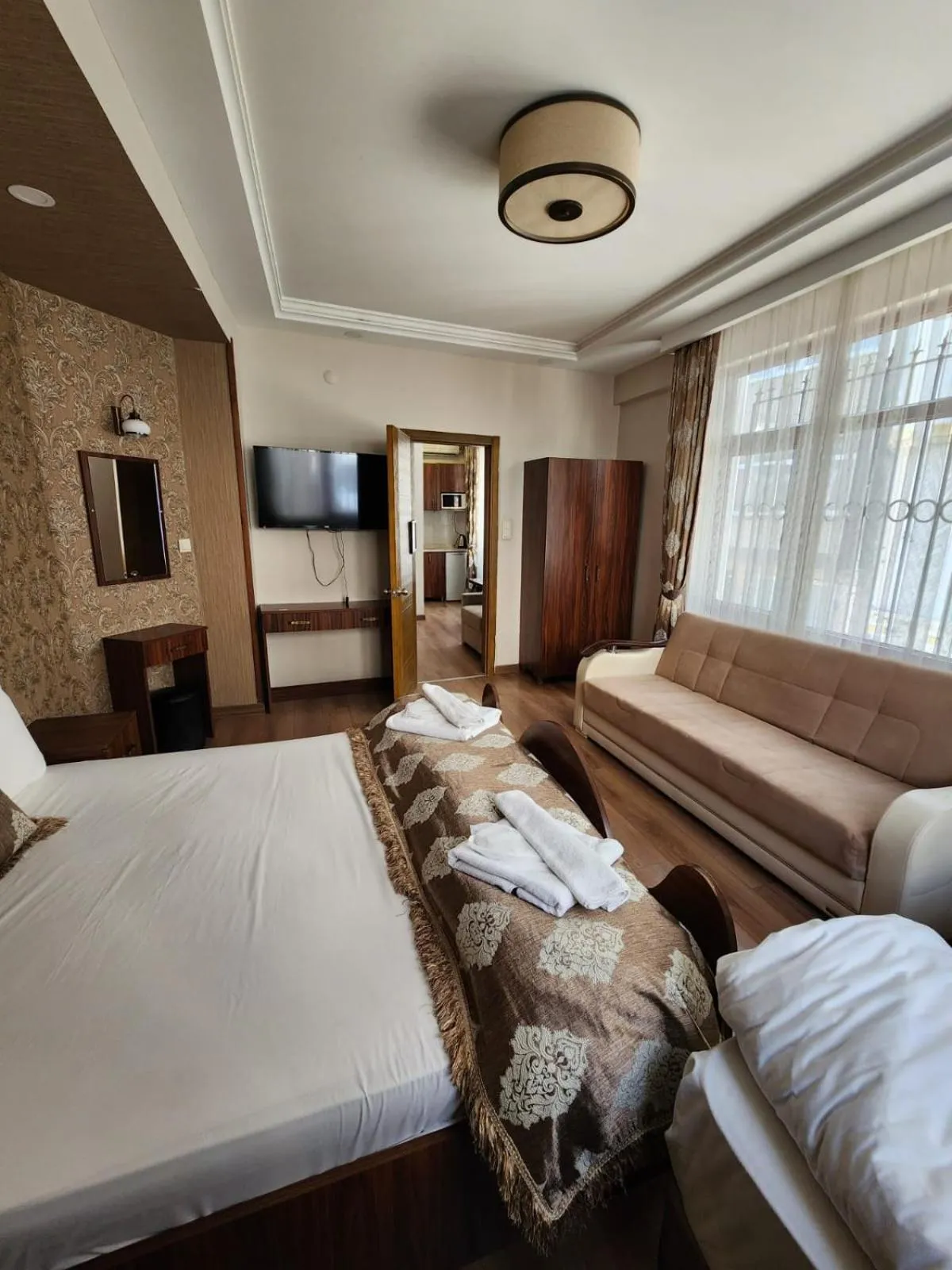Photo of the whole room, Bed in Capricorn by Otantik Suites
