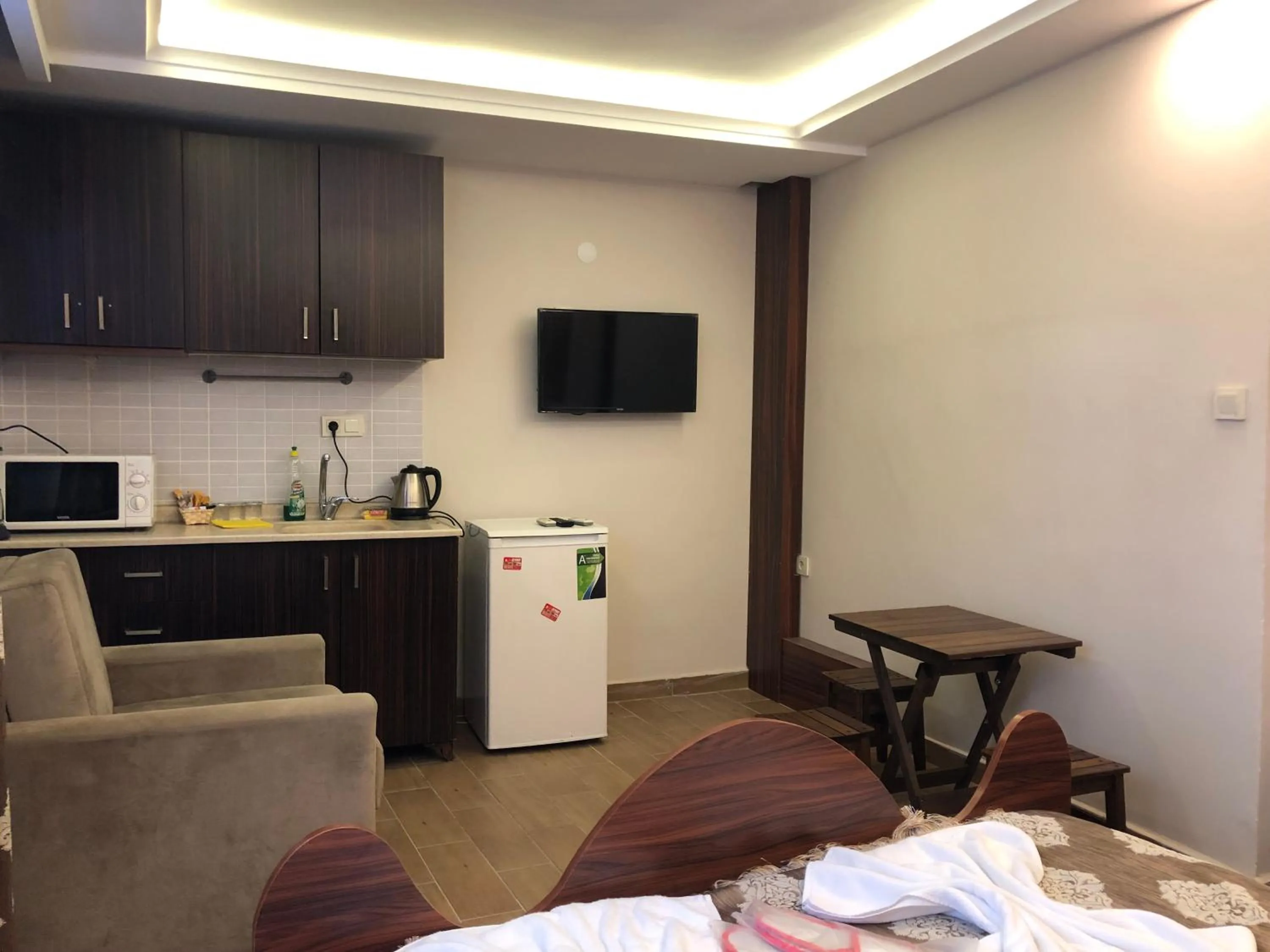 Kitchen or kitchenette, Bed in Capricorn by Otantik Suites