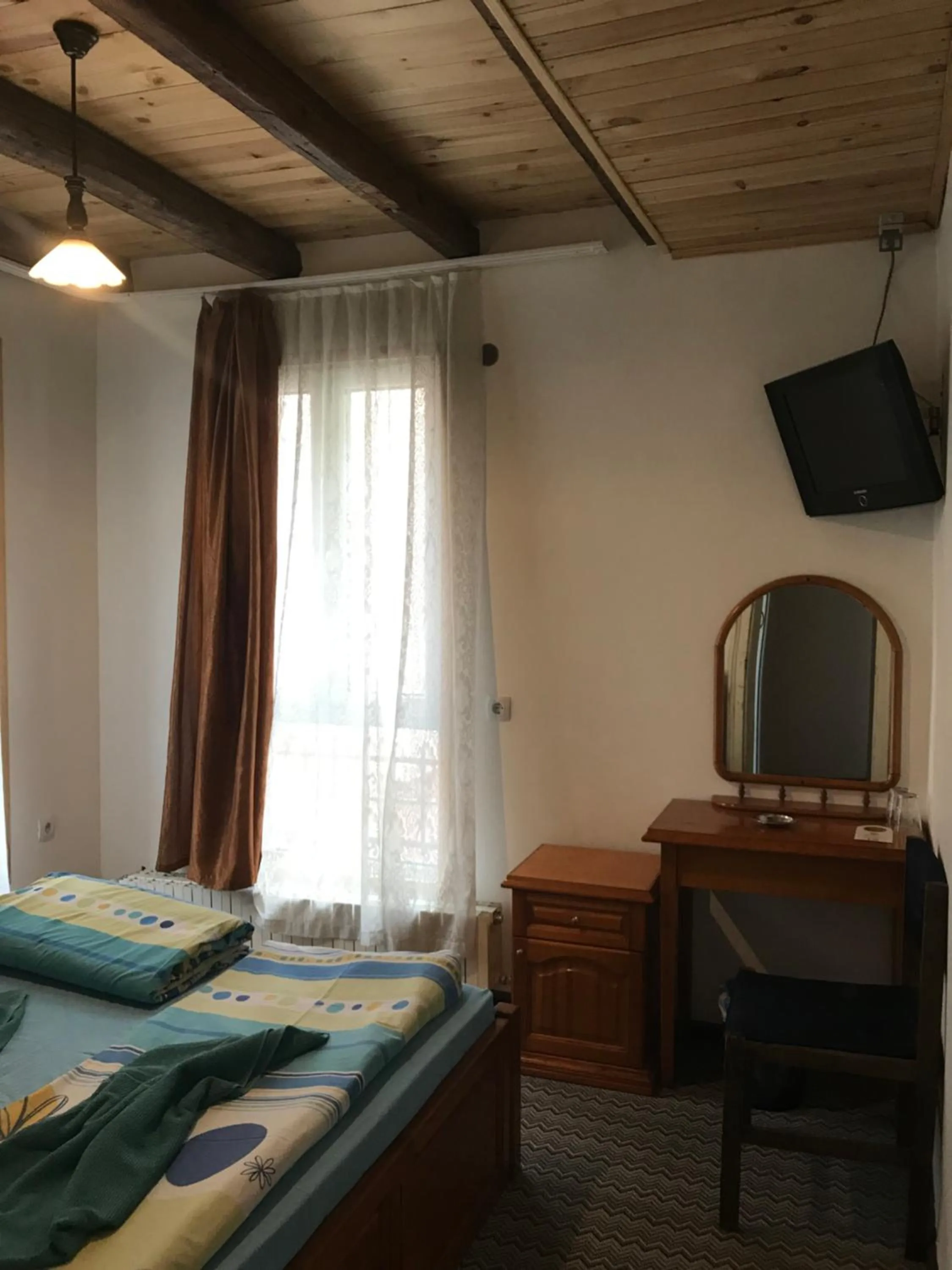 Bed in Pop Bogomil family hotel