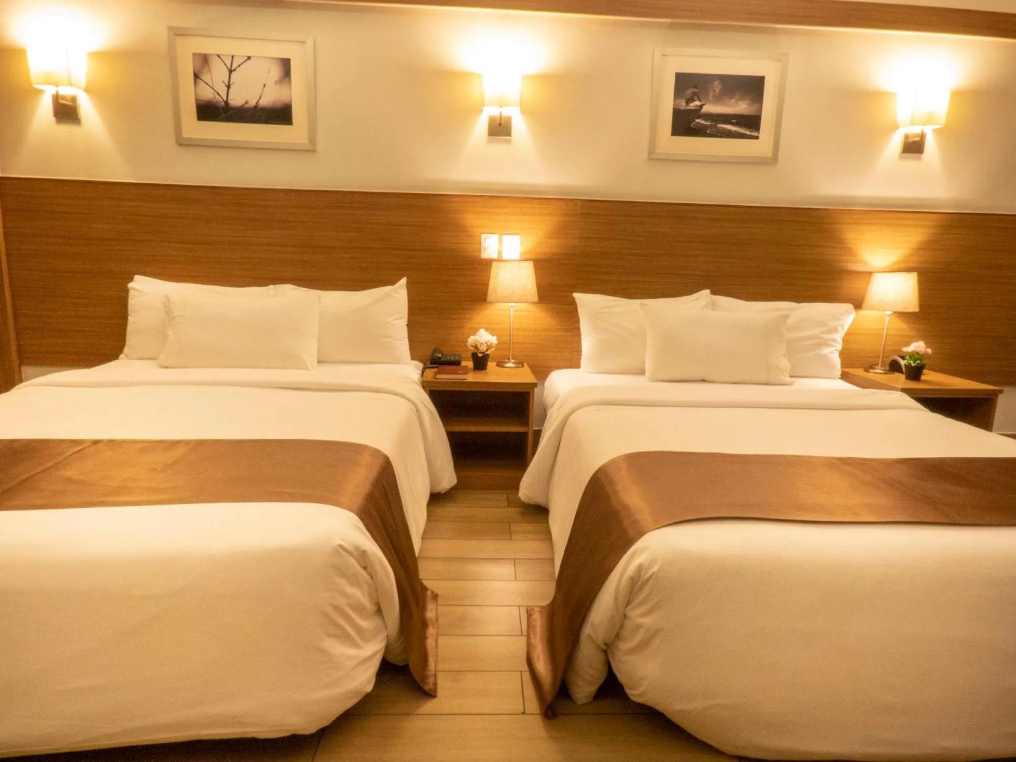 Bed in Weston Suites Hotel