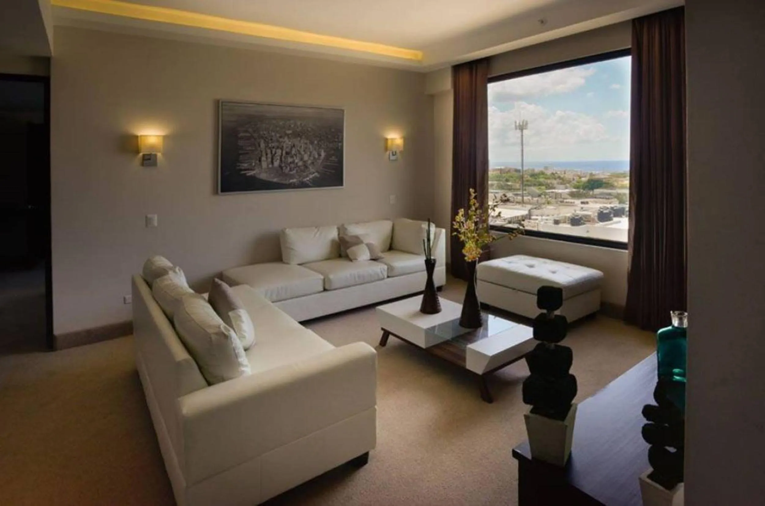 Seating area, Bed in Weston Suites Hotel