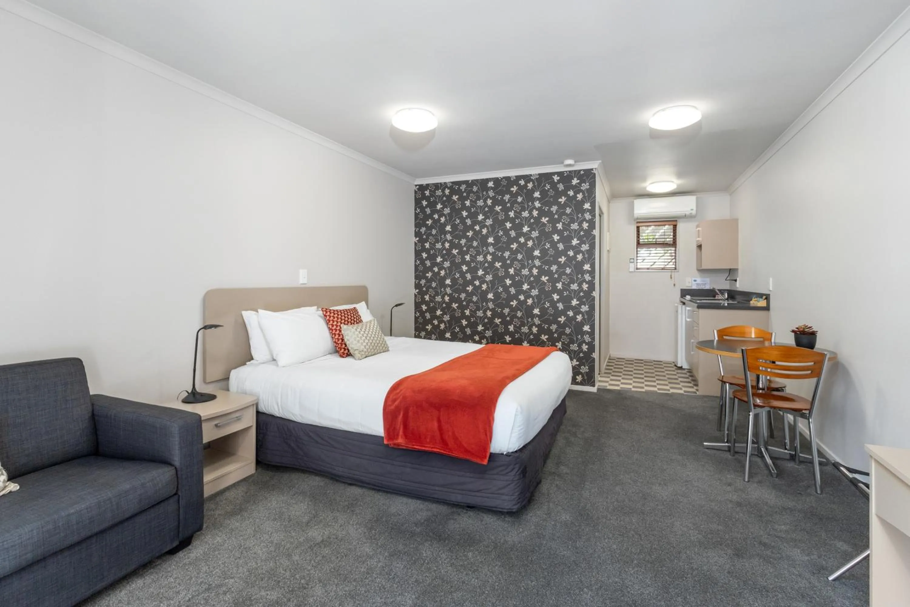 Bed in ASURE Scenic Route Motor Lodge