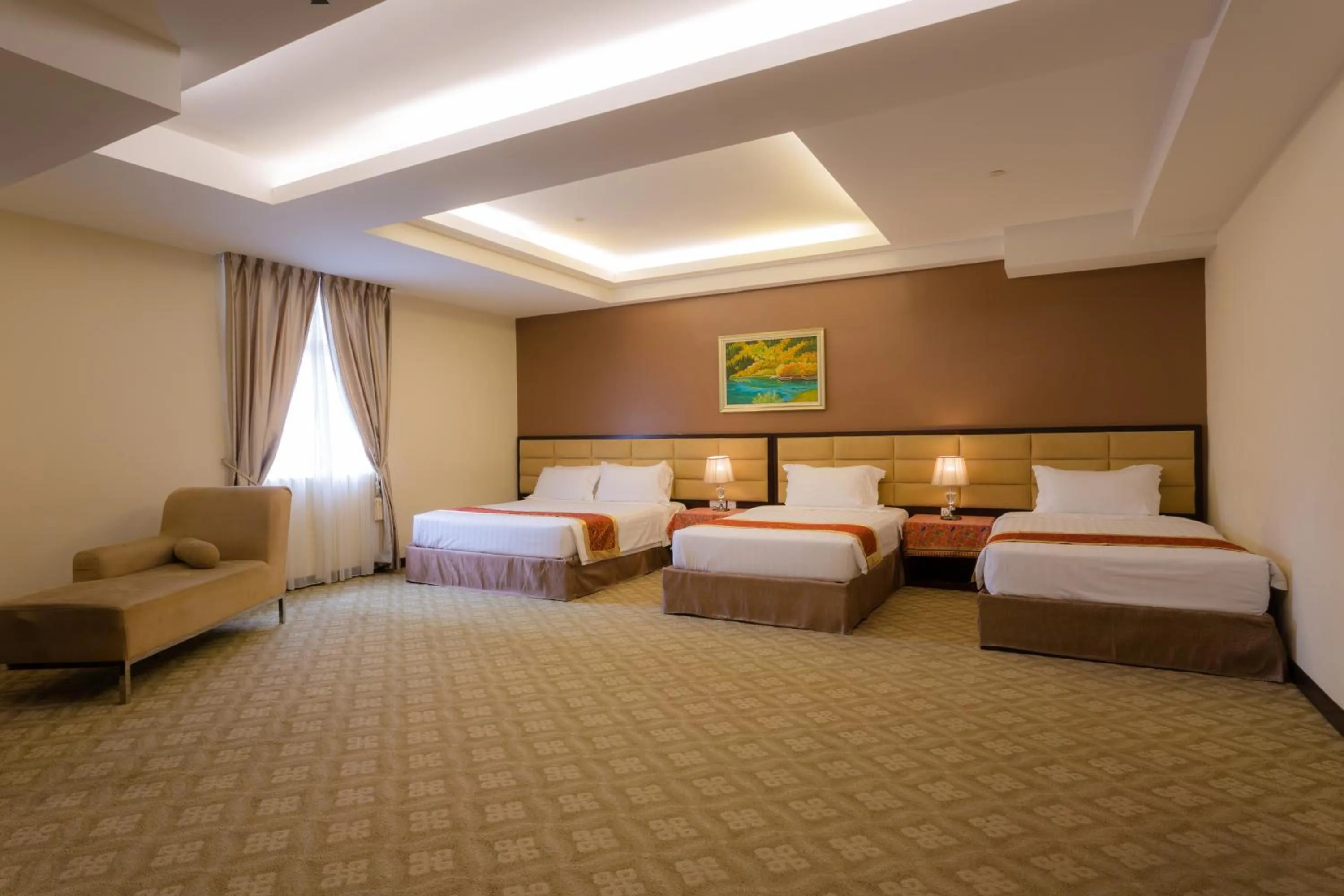 Bed in Hallmark Crown Hotel