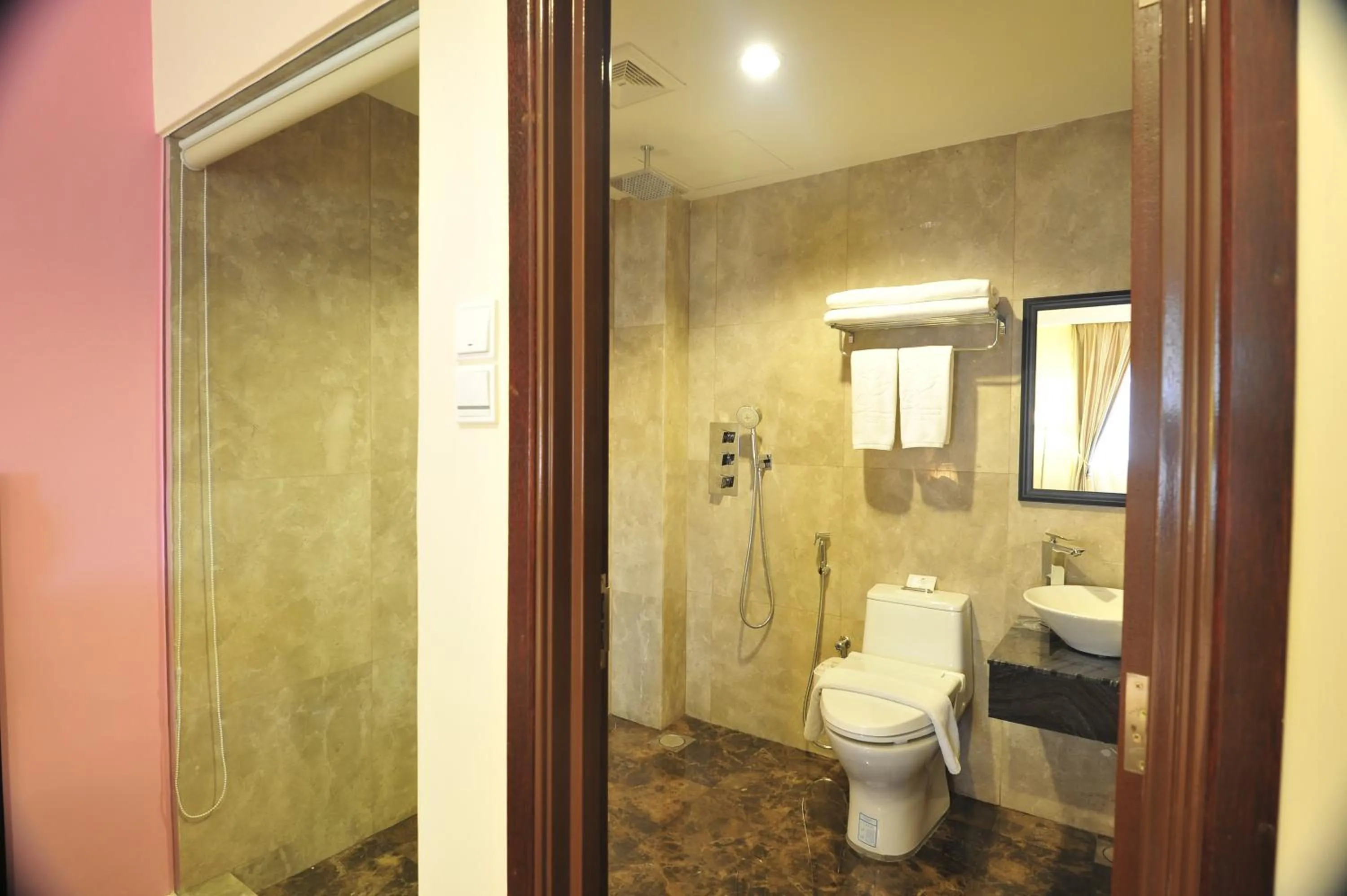 Bathroom in Hallmark Crown Hotel