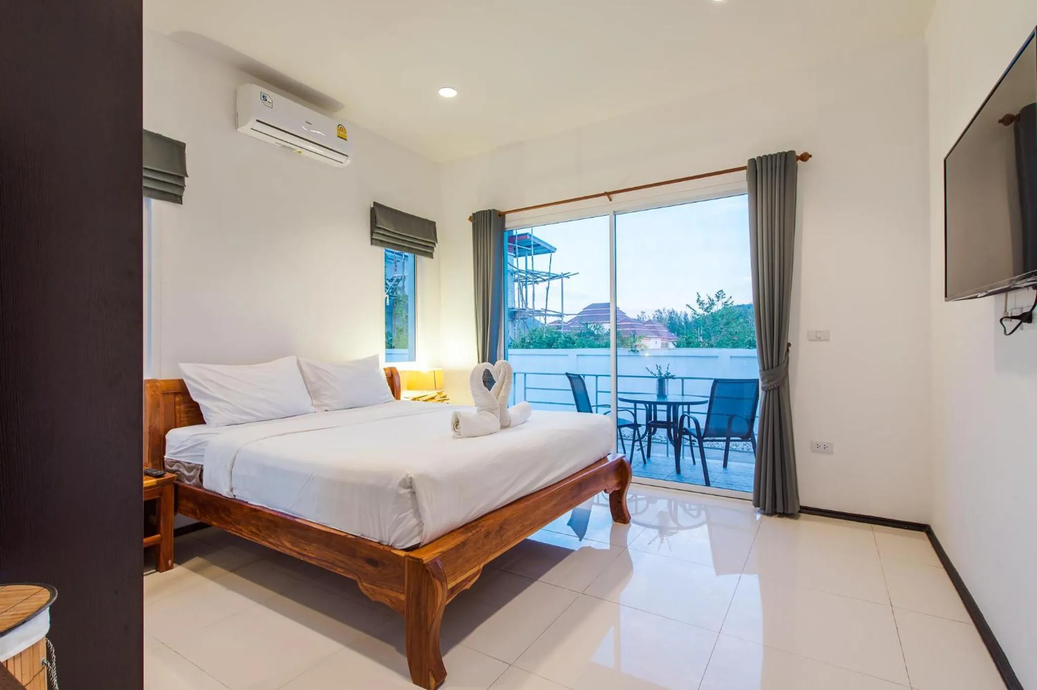 Bed in Oriental Beach Pearl Resort