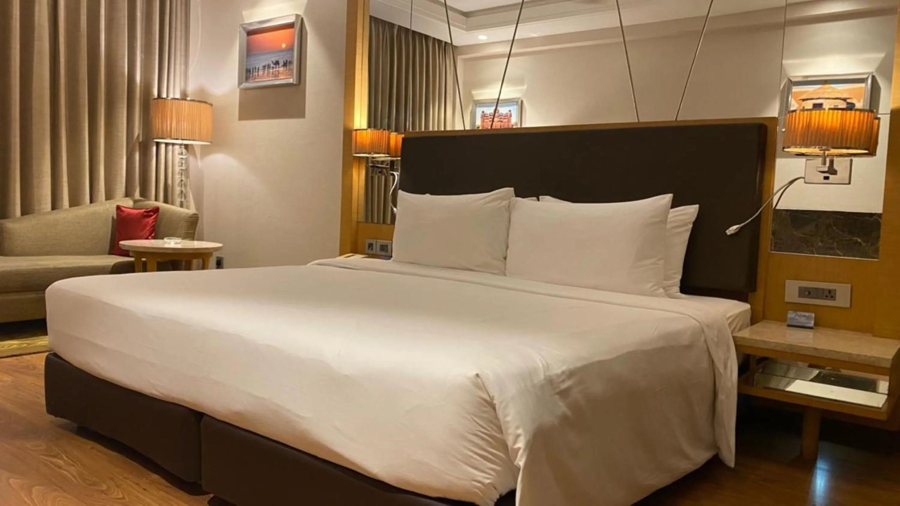 Living room, Bed in Radisson Resort & Spa Kandla