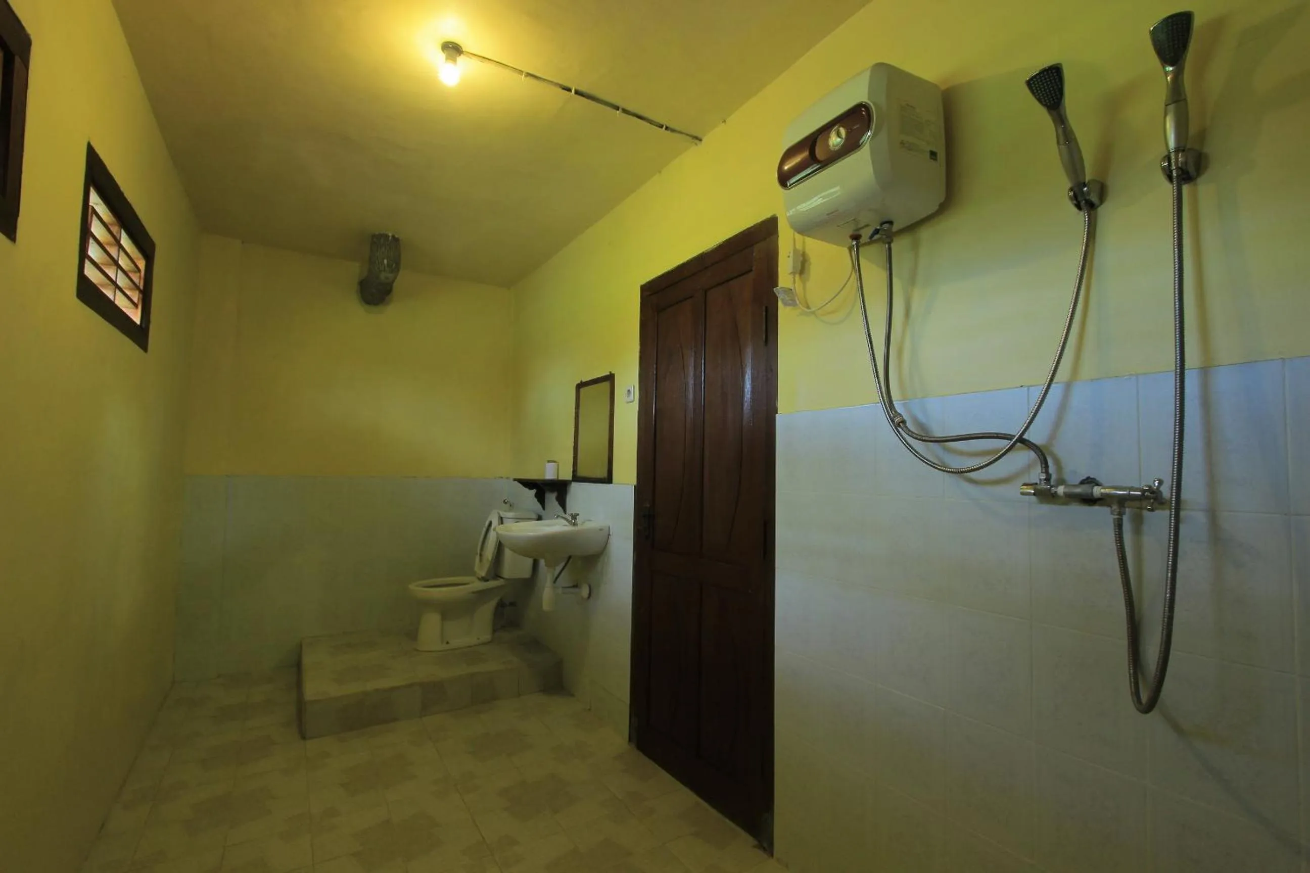 Bathroom in Kangkung Cottages