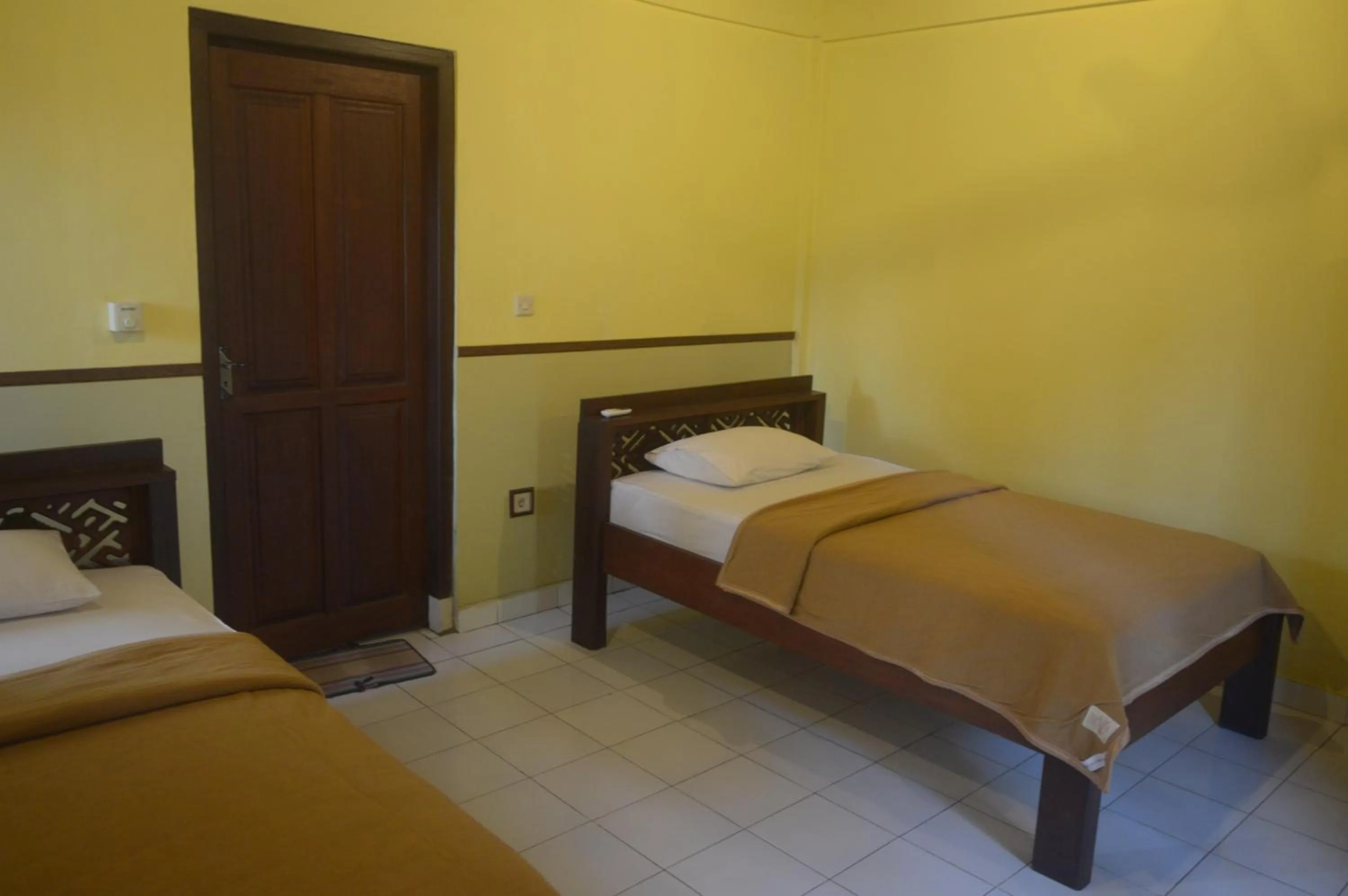 Bed in Kangkung Cottages