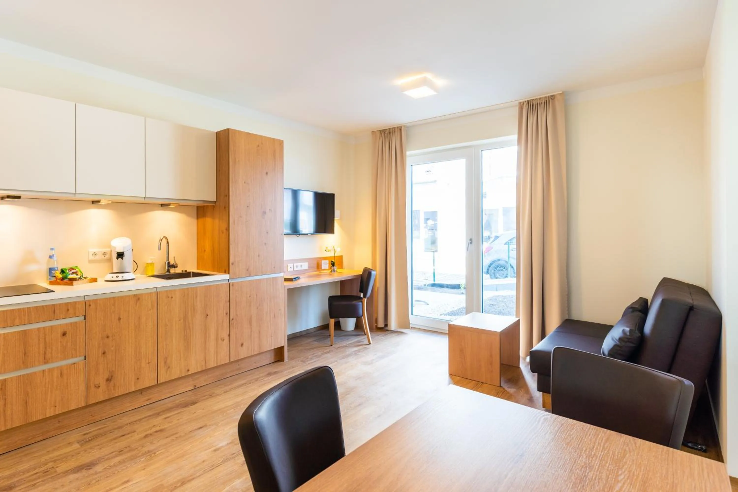 Kitchen or kitchenette in INhouse - Wohnen auf Zeit