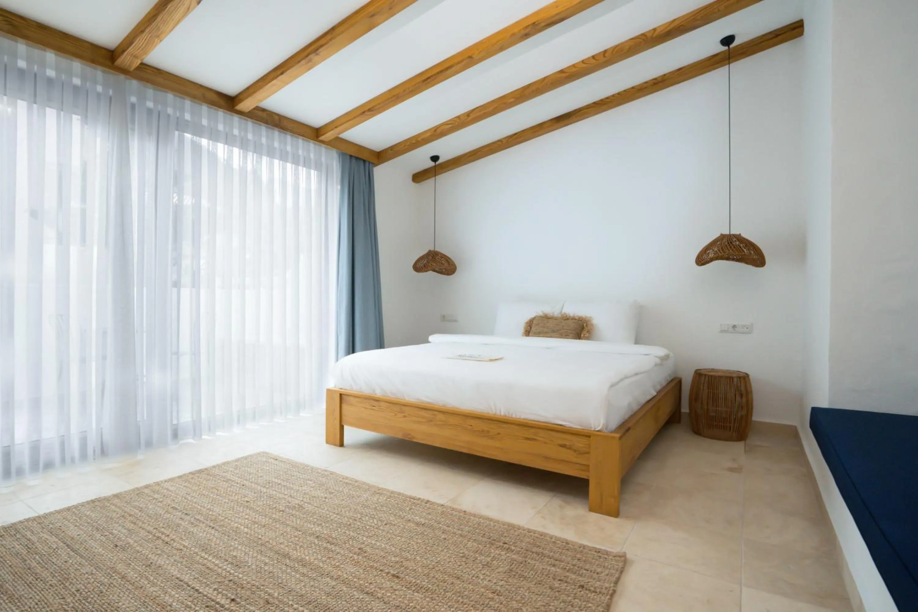 Bed in Kassandra Boutique Hotel