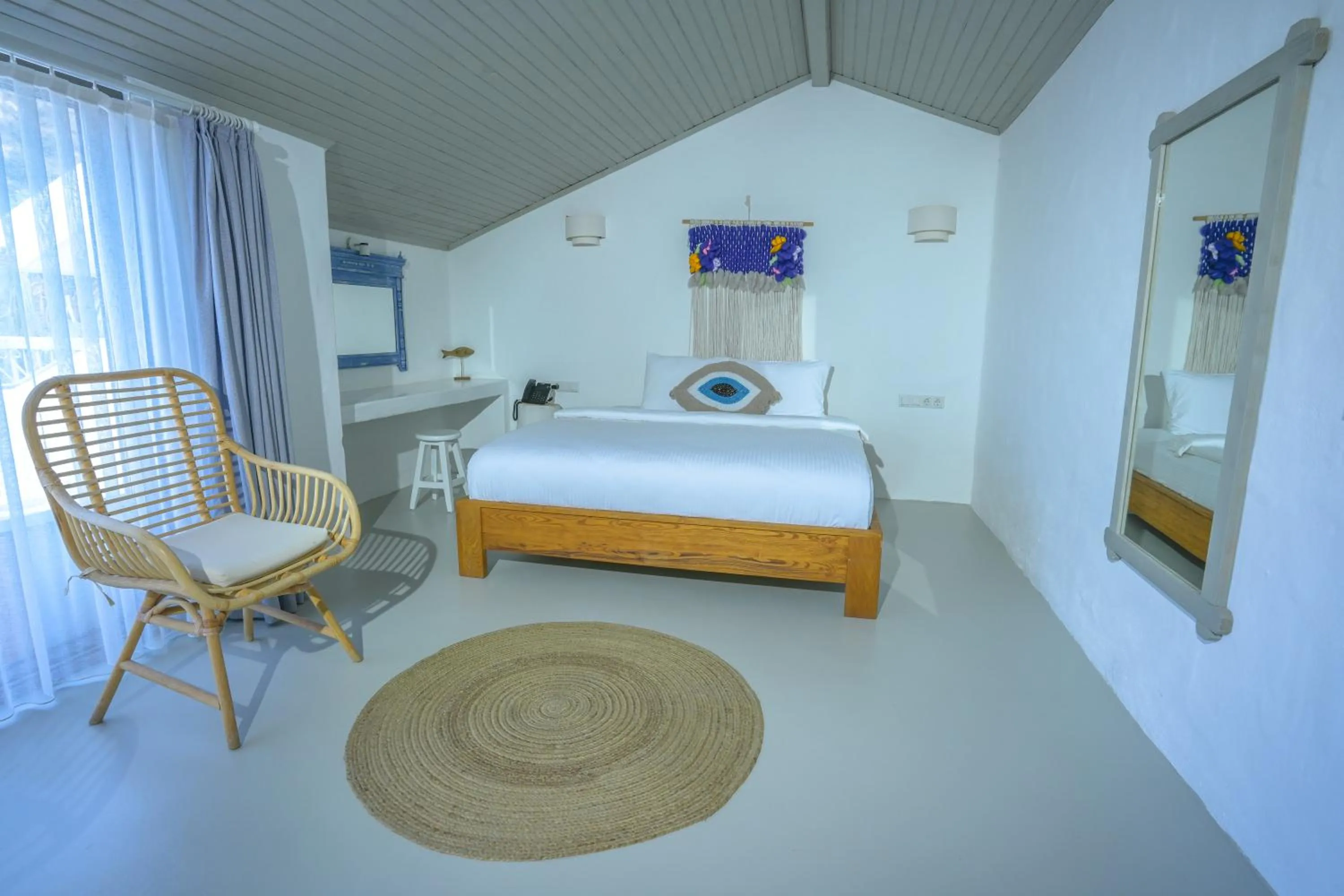 Bed in Kassandra Boutique Hotel