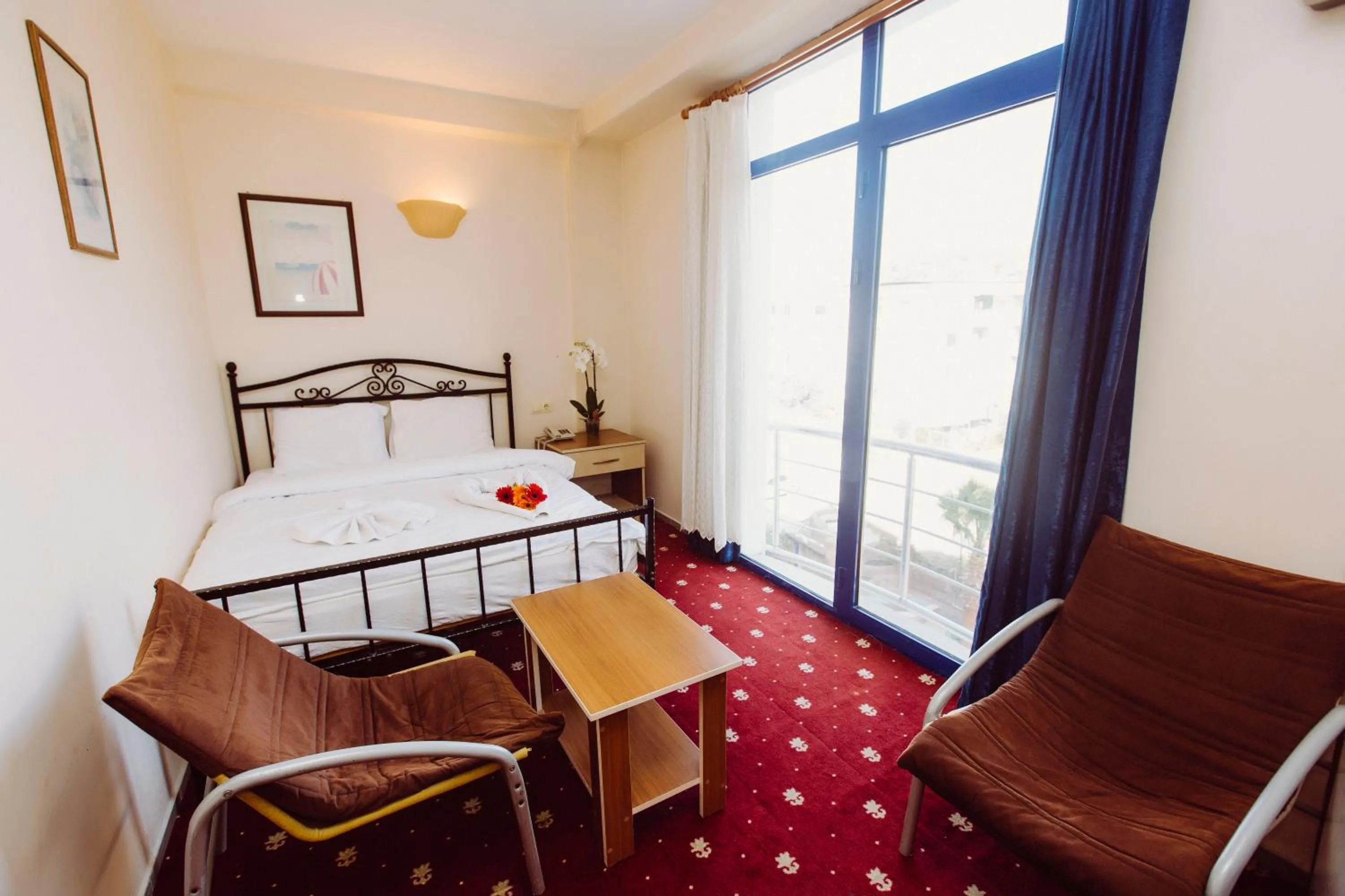 Bed in Ozalp Han Hotel