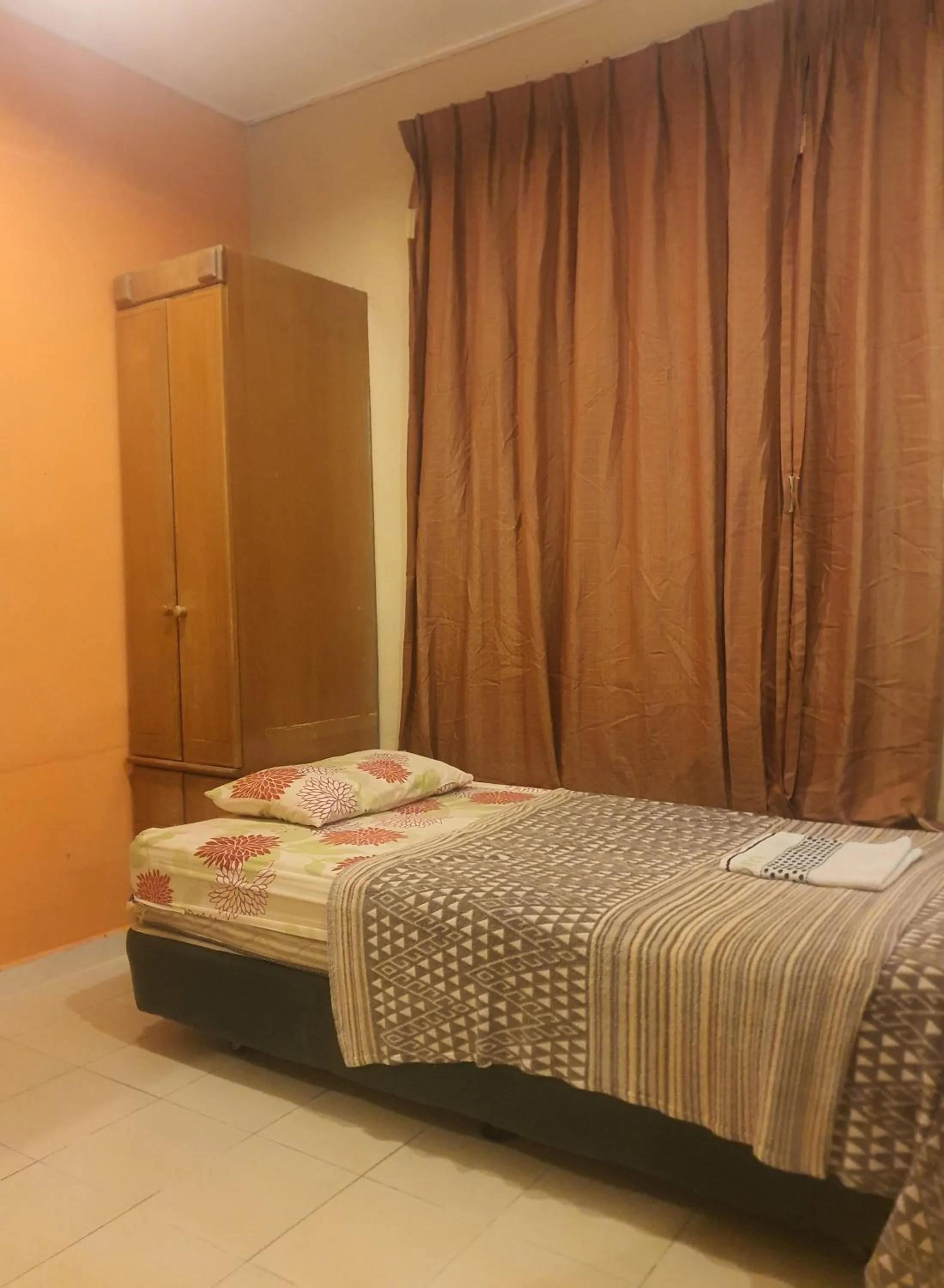 Bed in THE COTTAGE LANGKAWI