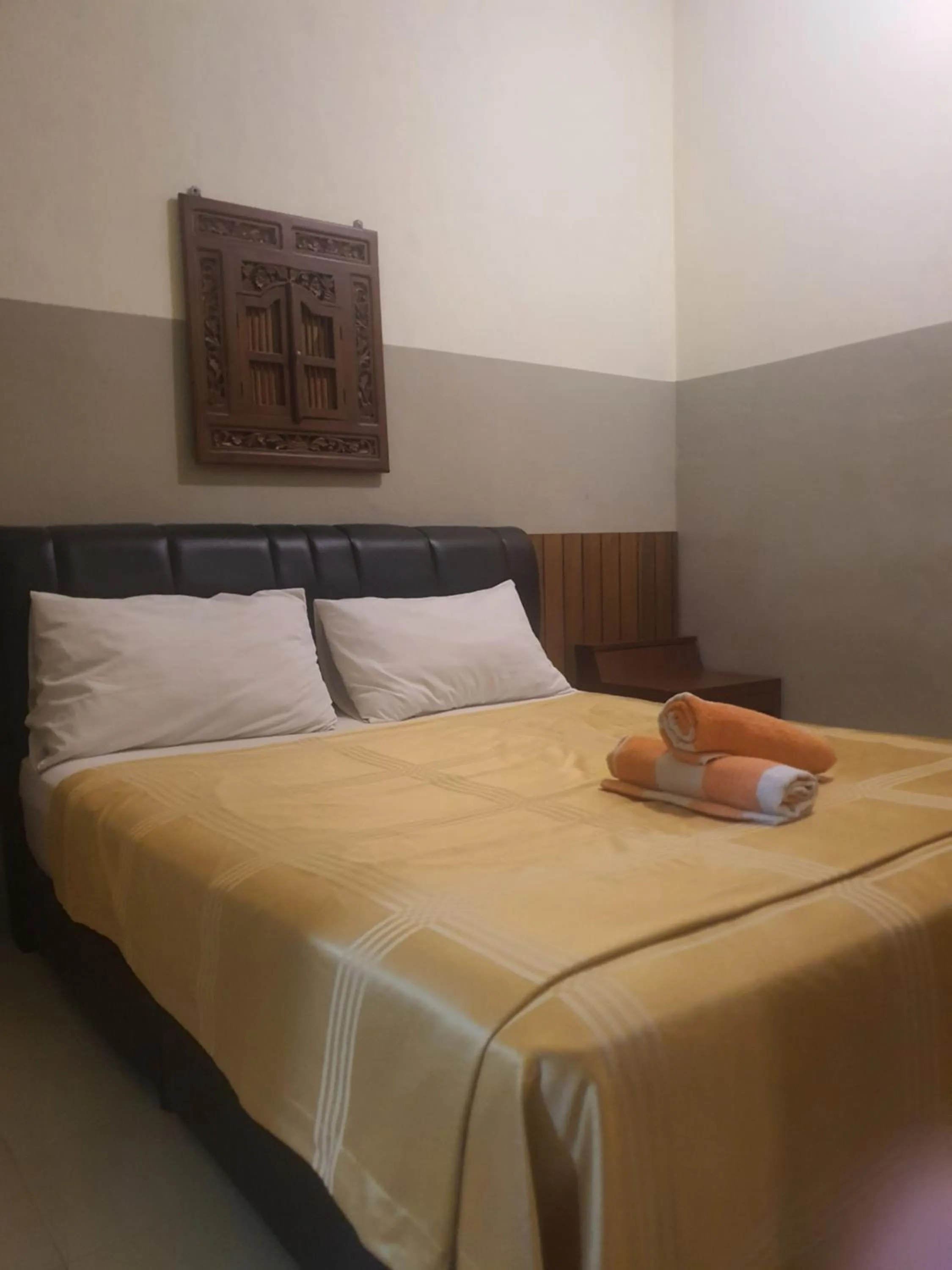 Bed in THE COTTAGE LANGKAWI