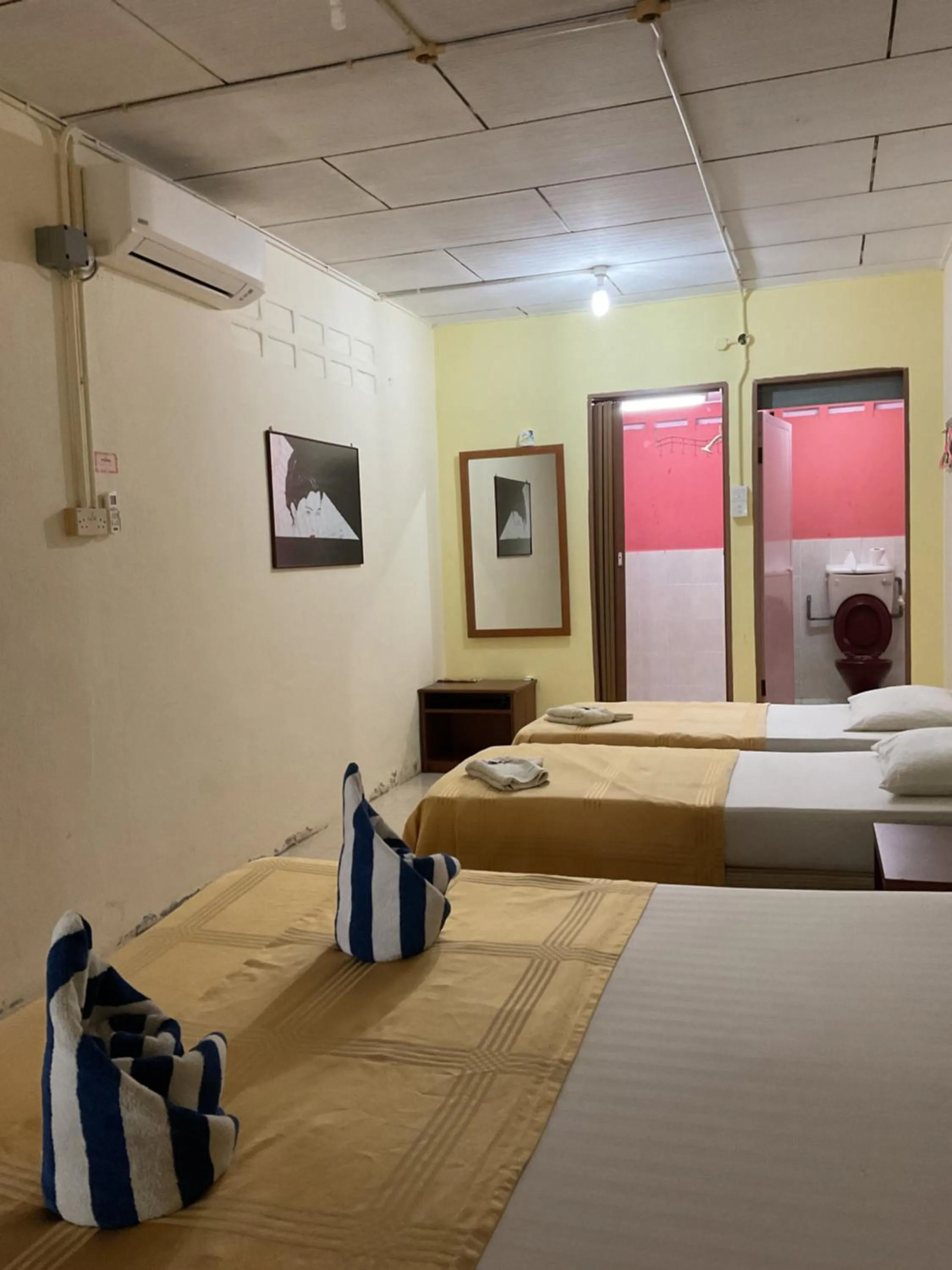 Bed in THE COTTAGE LANGKAWI