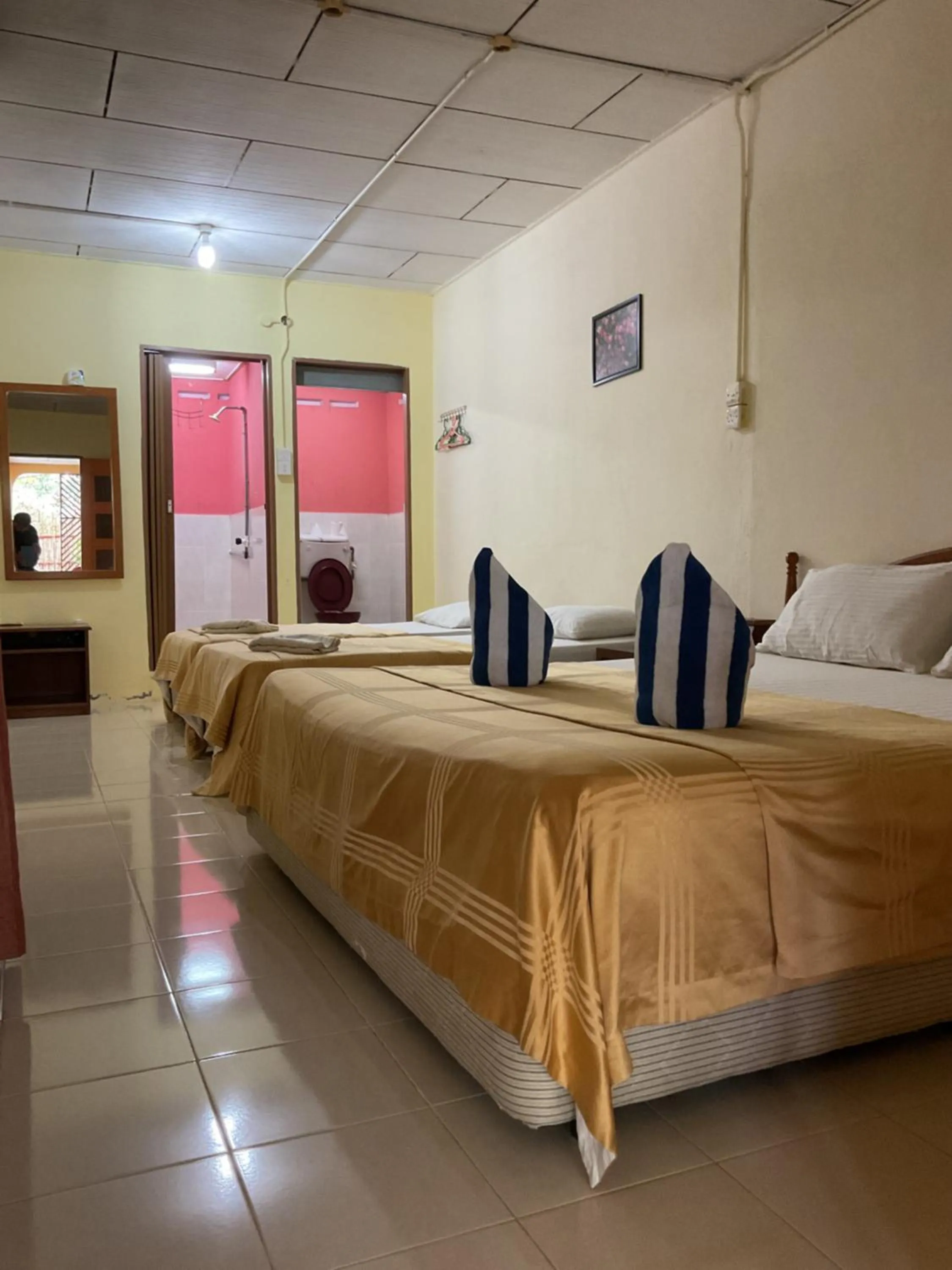 Bed in THE COTTAGE LANGKAWI