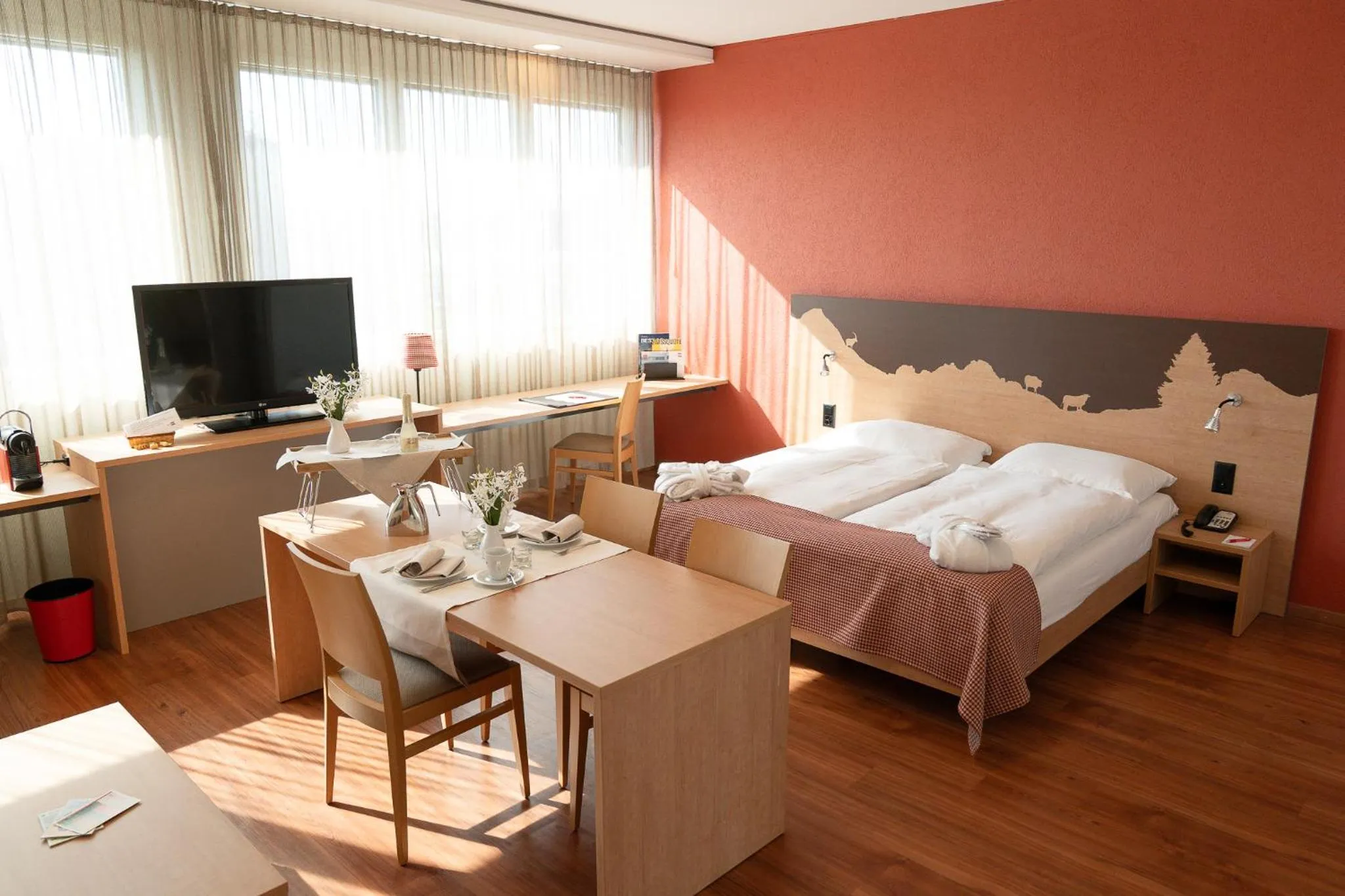 Photo of the whole room, Bed in SwissEver Hotel Zug