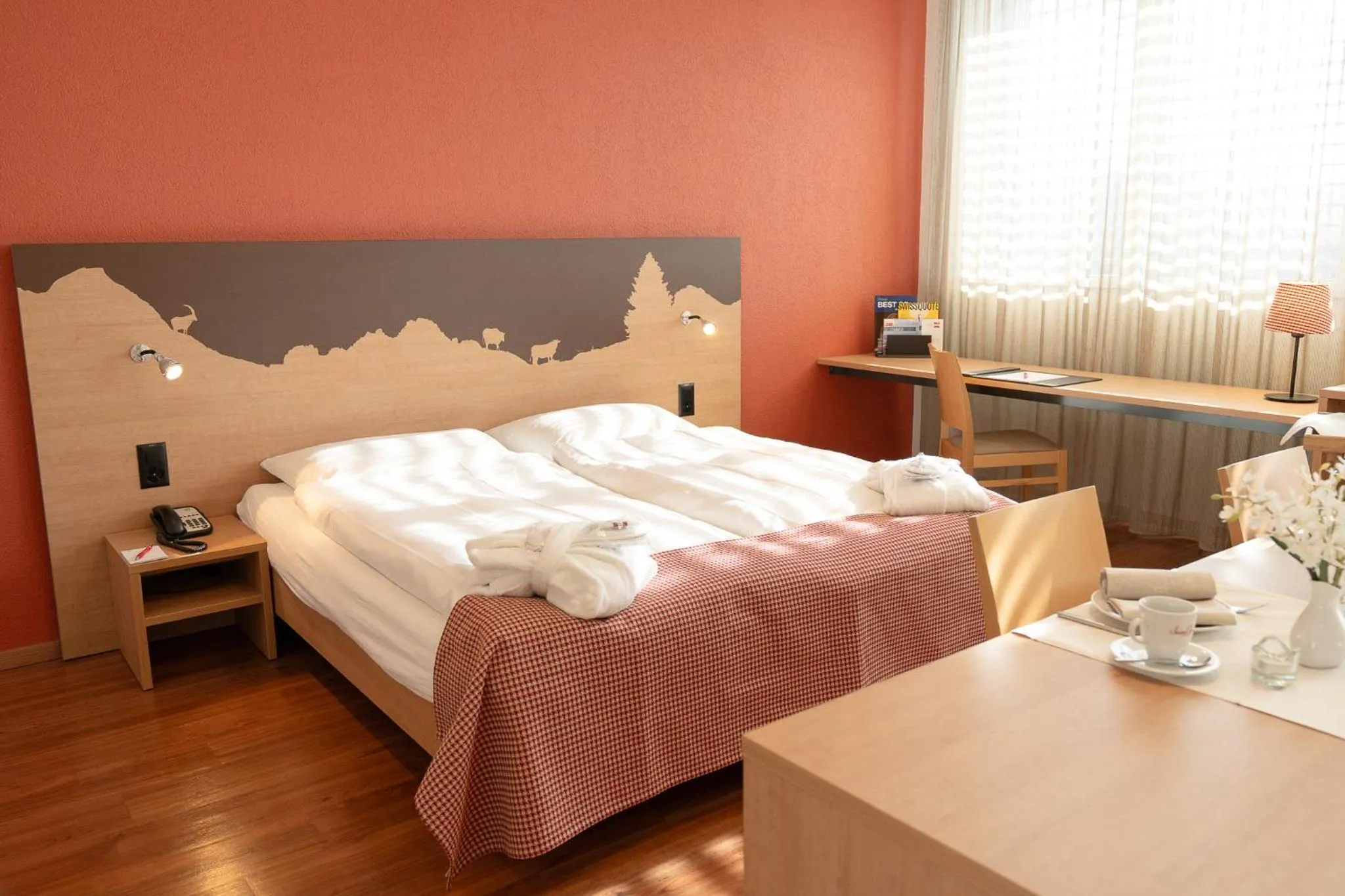 Bed in SwissEver Hotel Zug