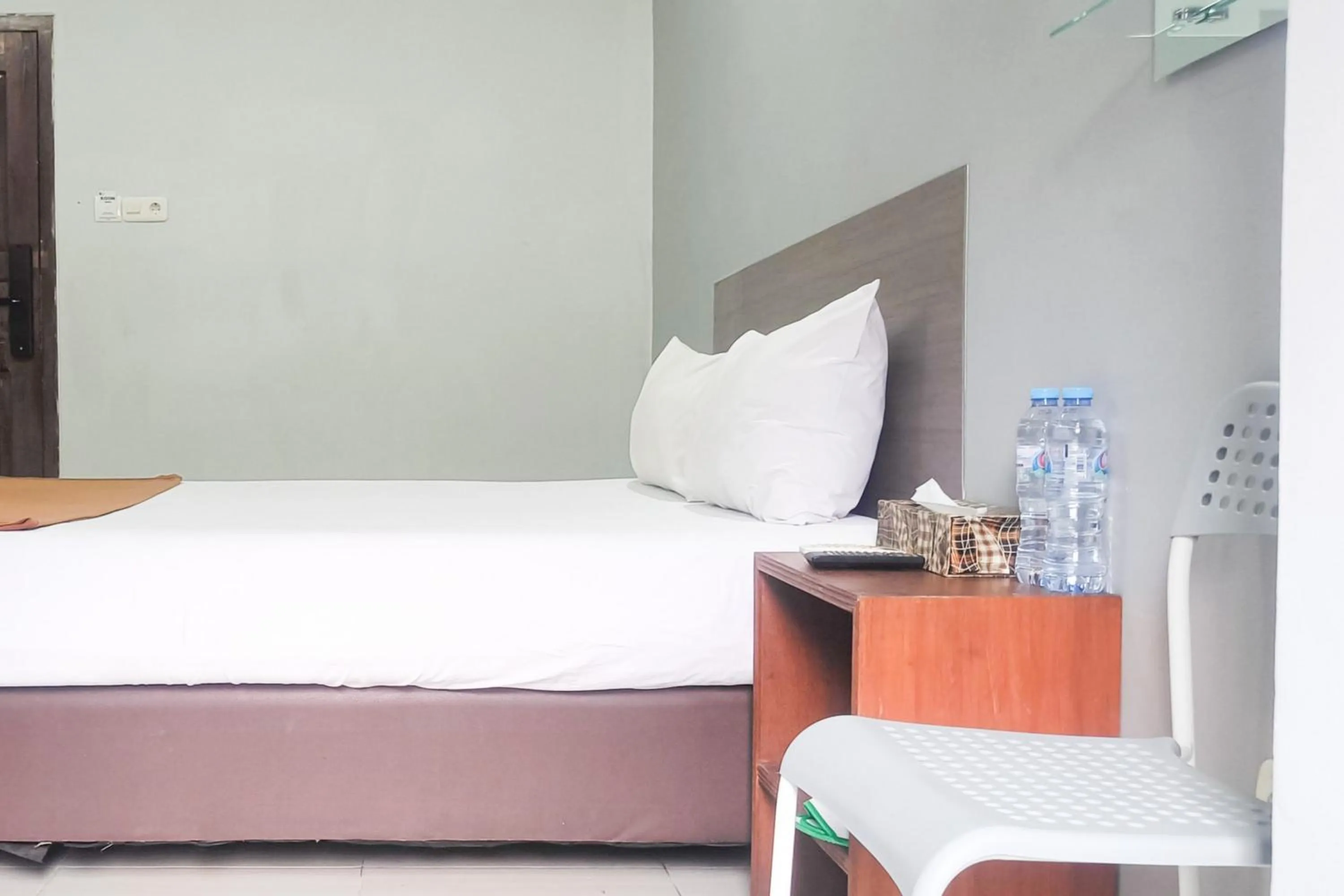 Bedroom, Bed in Hotel Prisma Mitra RedDoorz