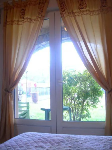 Garden view, Bed in Hôtel de la Madeleine Anduze