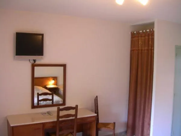 Bedroom in Hôtel de la Madeleine Anduze