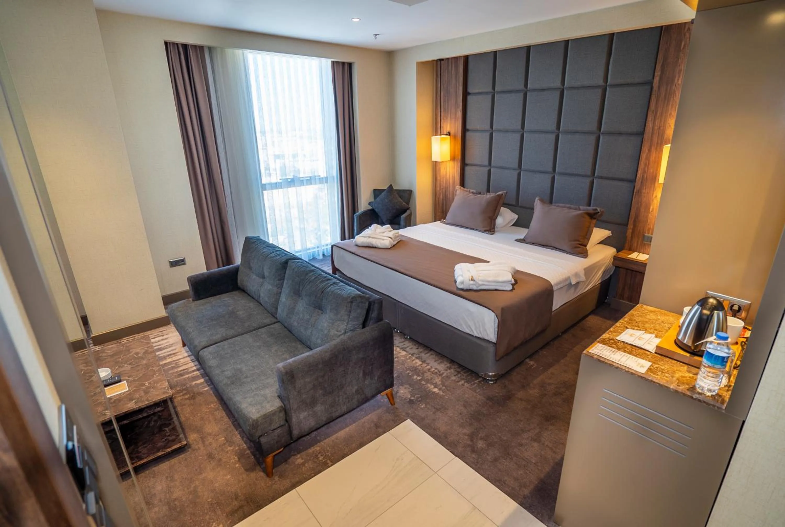 Bed in NEW KARAMAN HOTEL