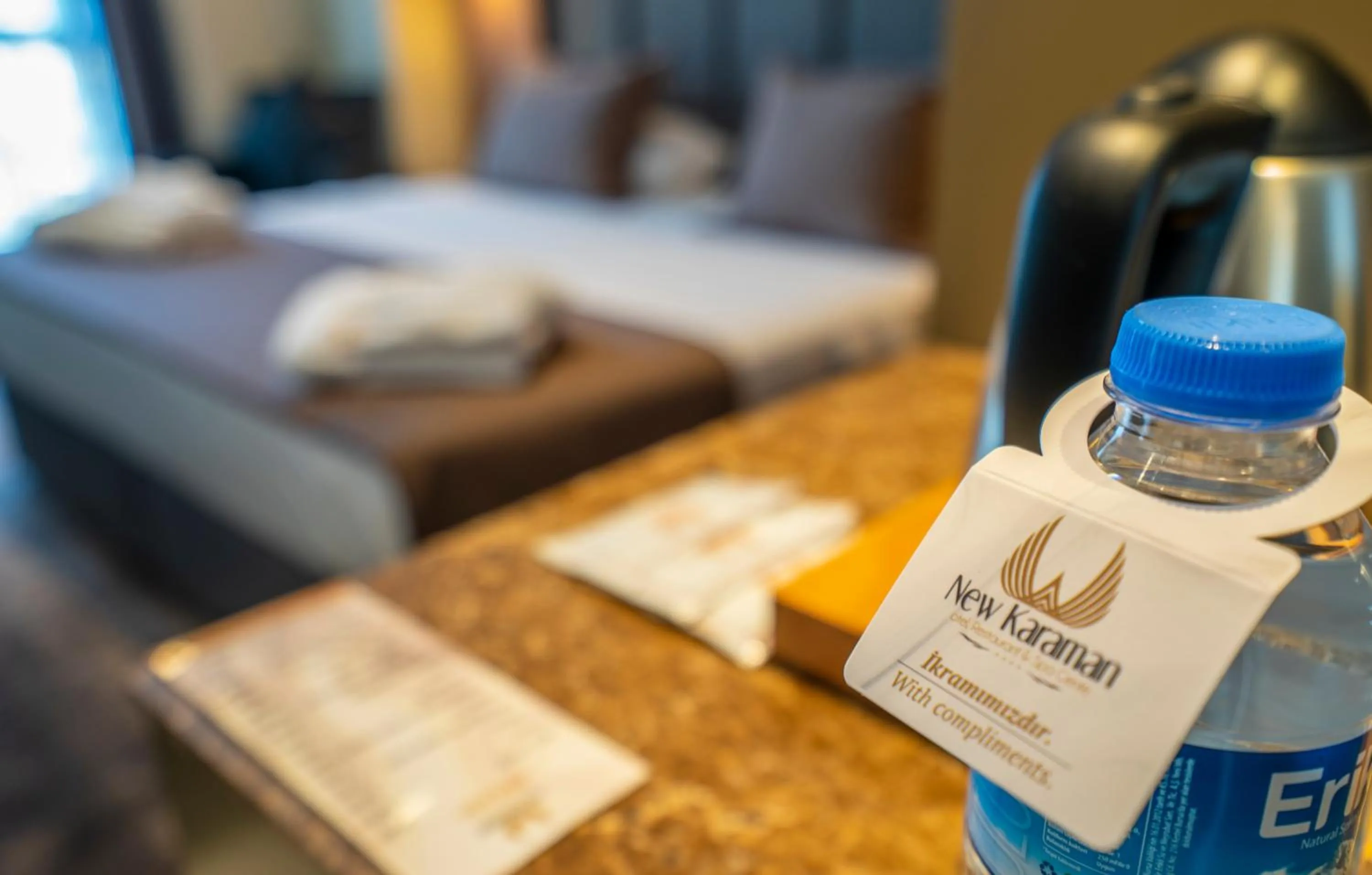 Bed in NEW KARAMAN HOTEL