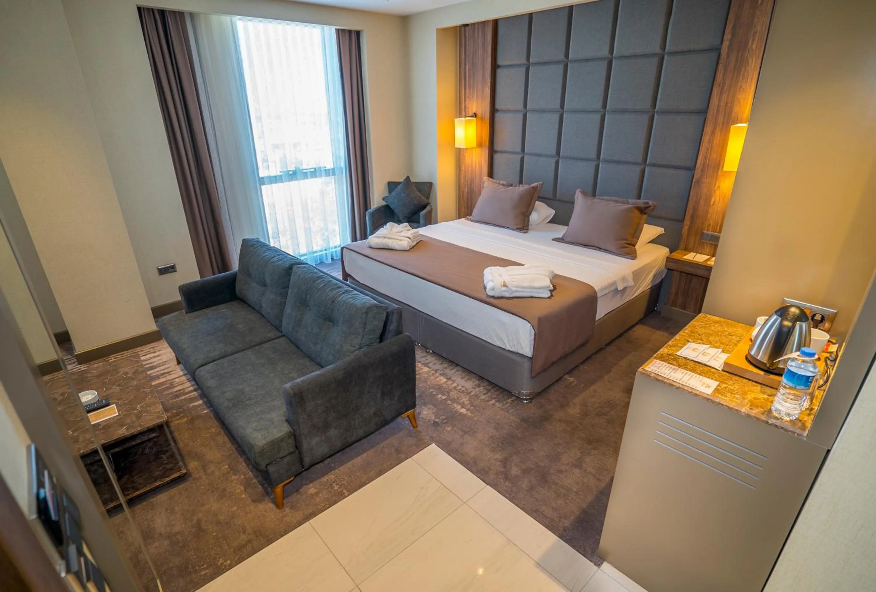Bed in NEW KARAMAN HOTEL