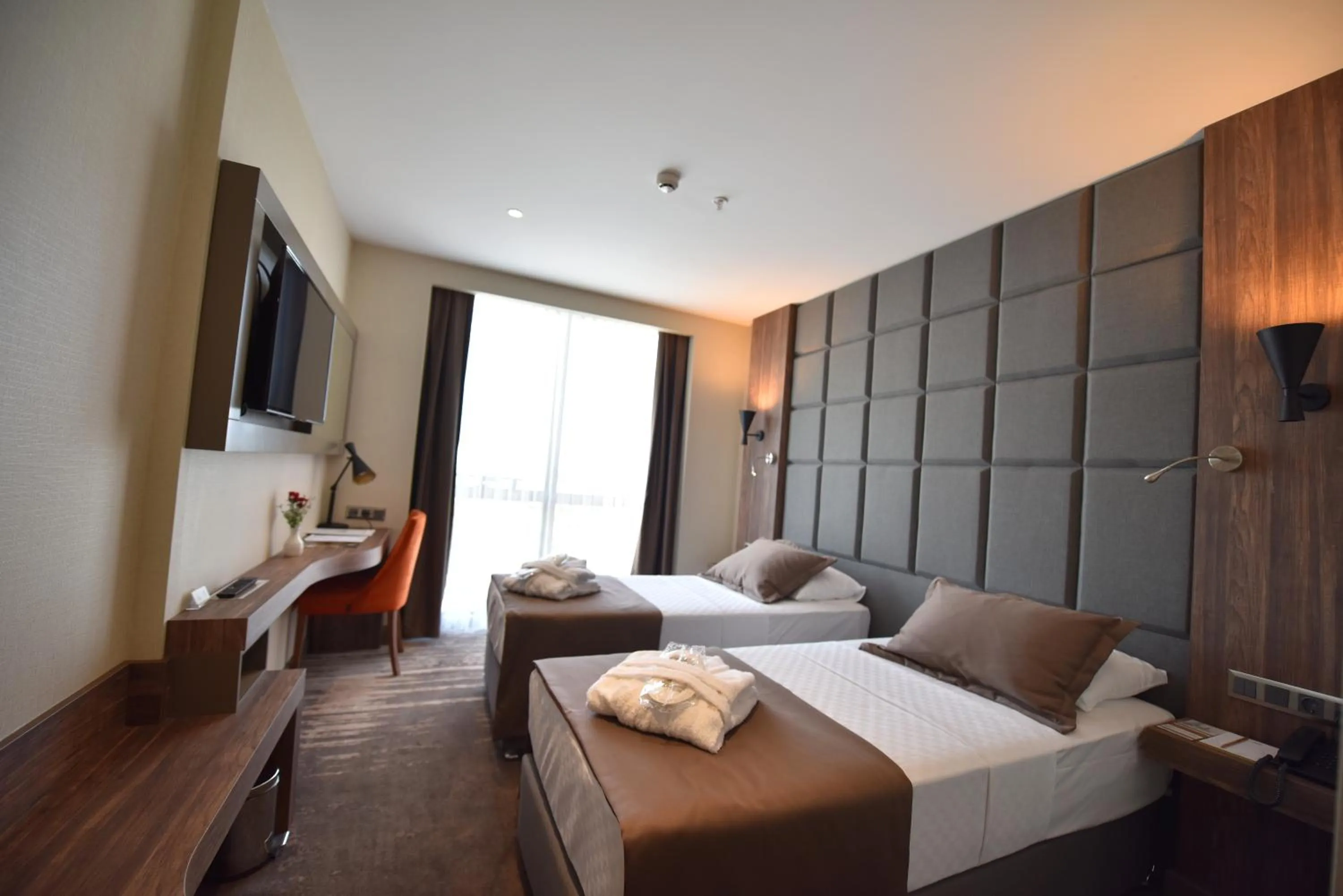 Bed in NEW KARAMAN HOTEL