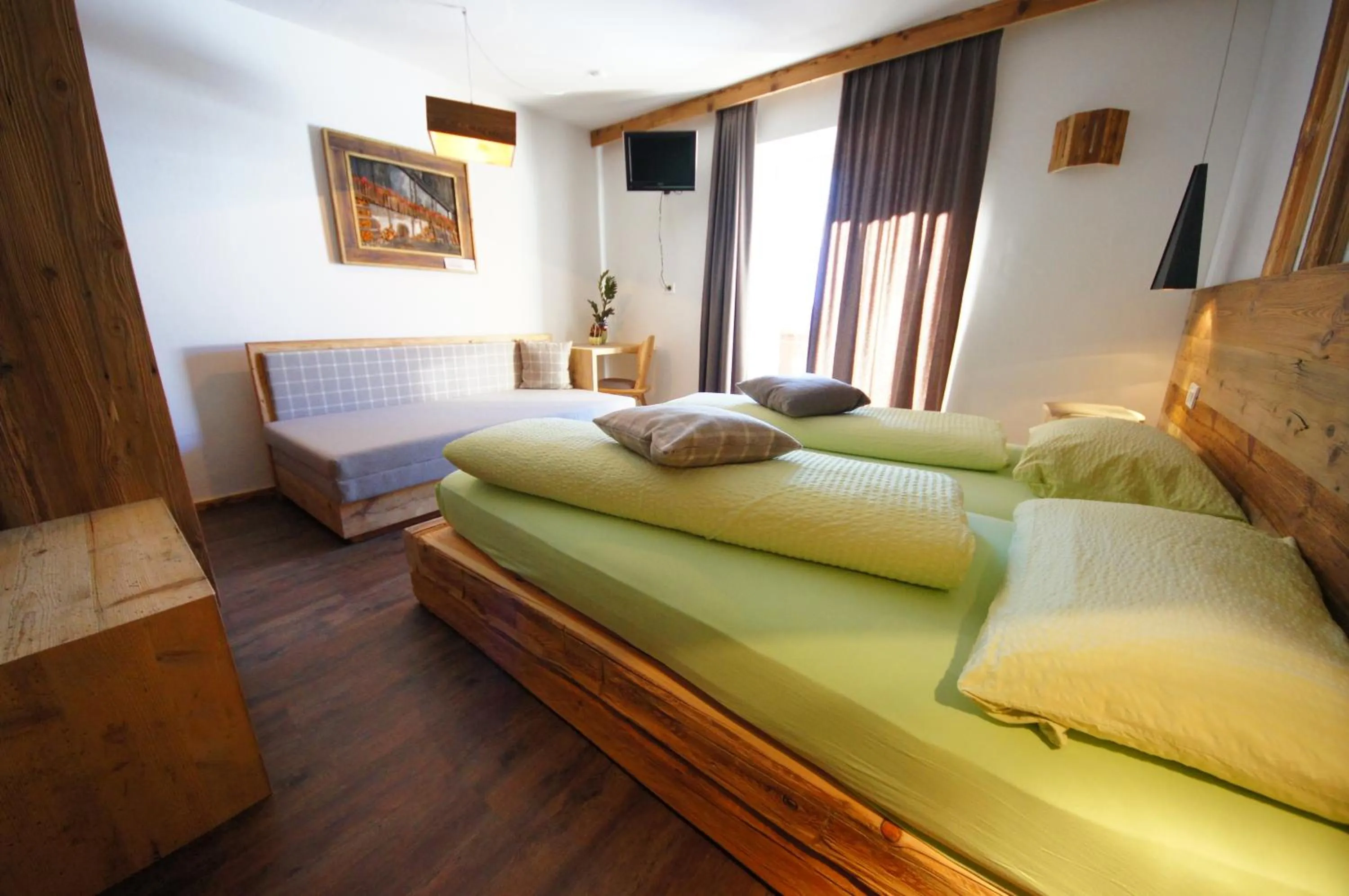 Bedroom in Appartamenti Residence Pars