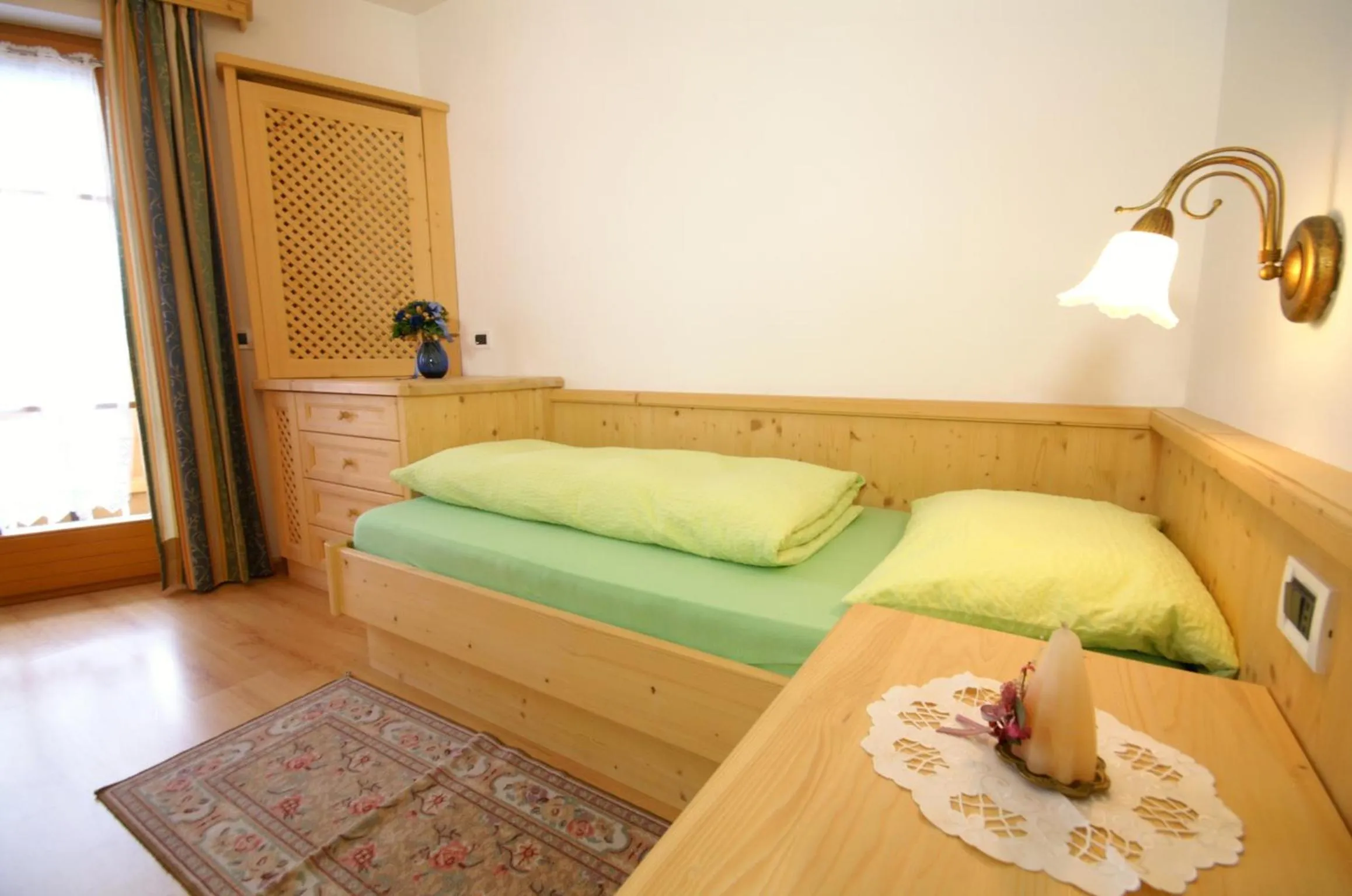 Bedroom in Appartamenti Residence Pars