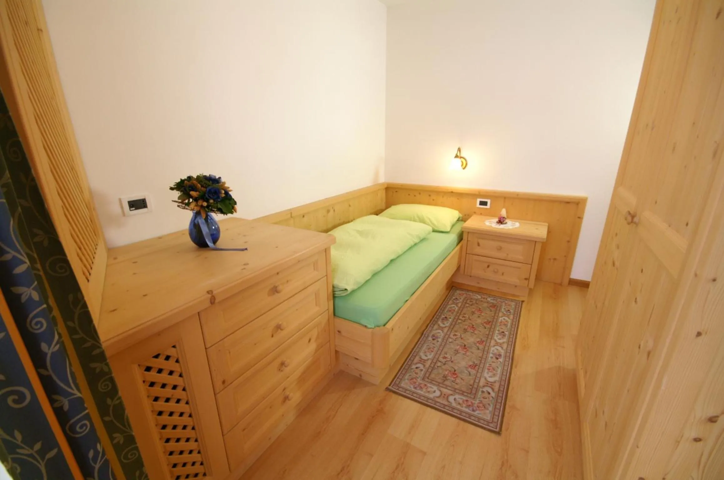 Bedroom in Appartamenti Residence Pars