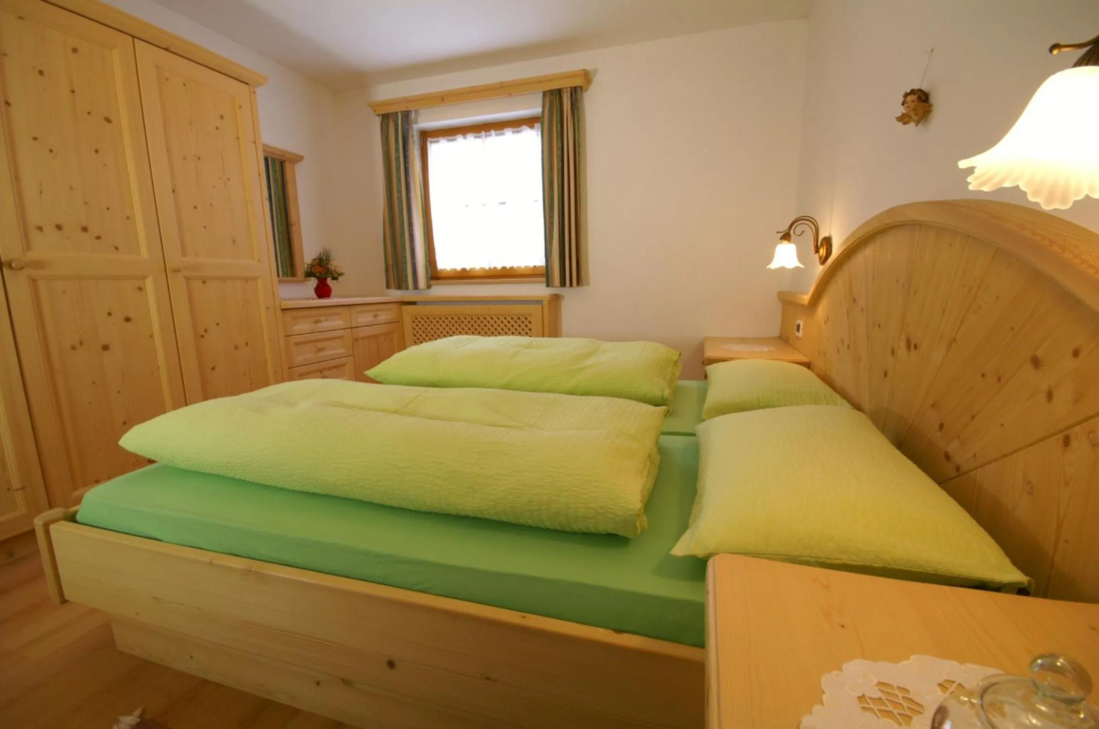 Bedroom in Appartamenti Residence Pars