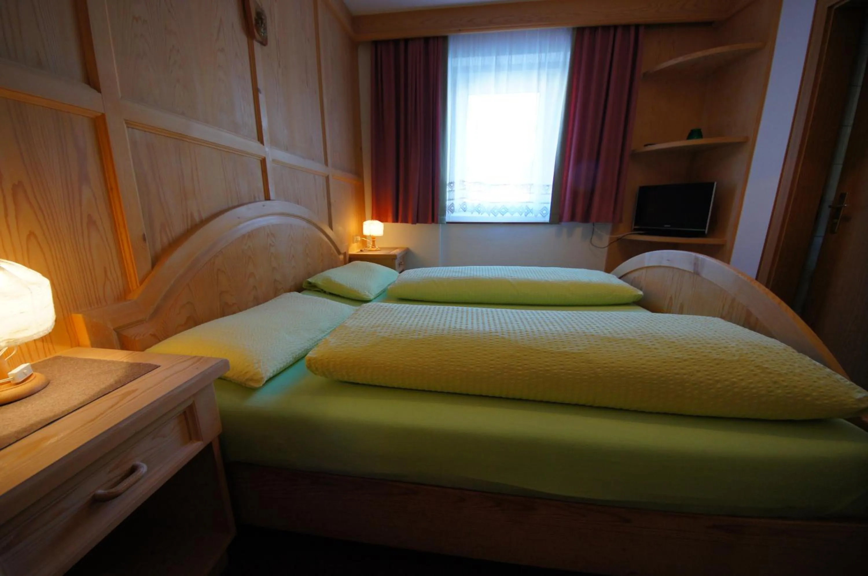 Bedroom in Appartamenti Residence Pars