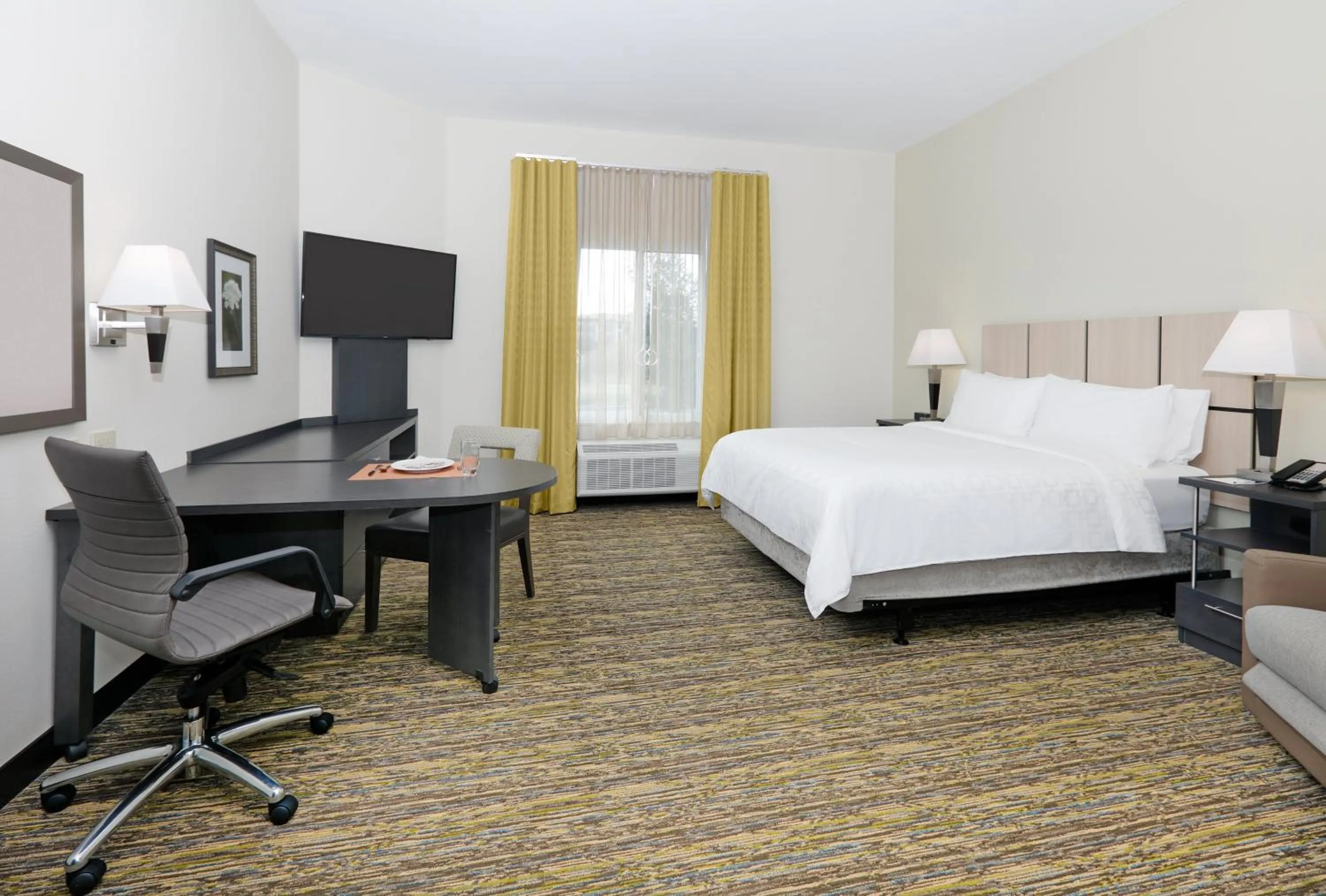 Photo of the whole room, Bed in Candlewood Suites Dallas NW - Farmers Branch by IHG