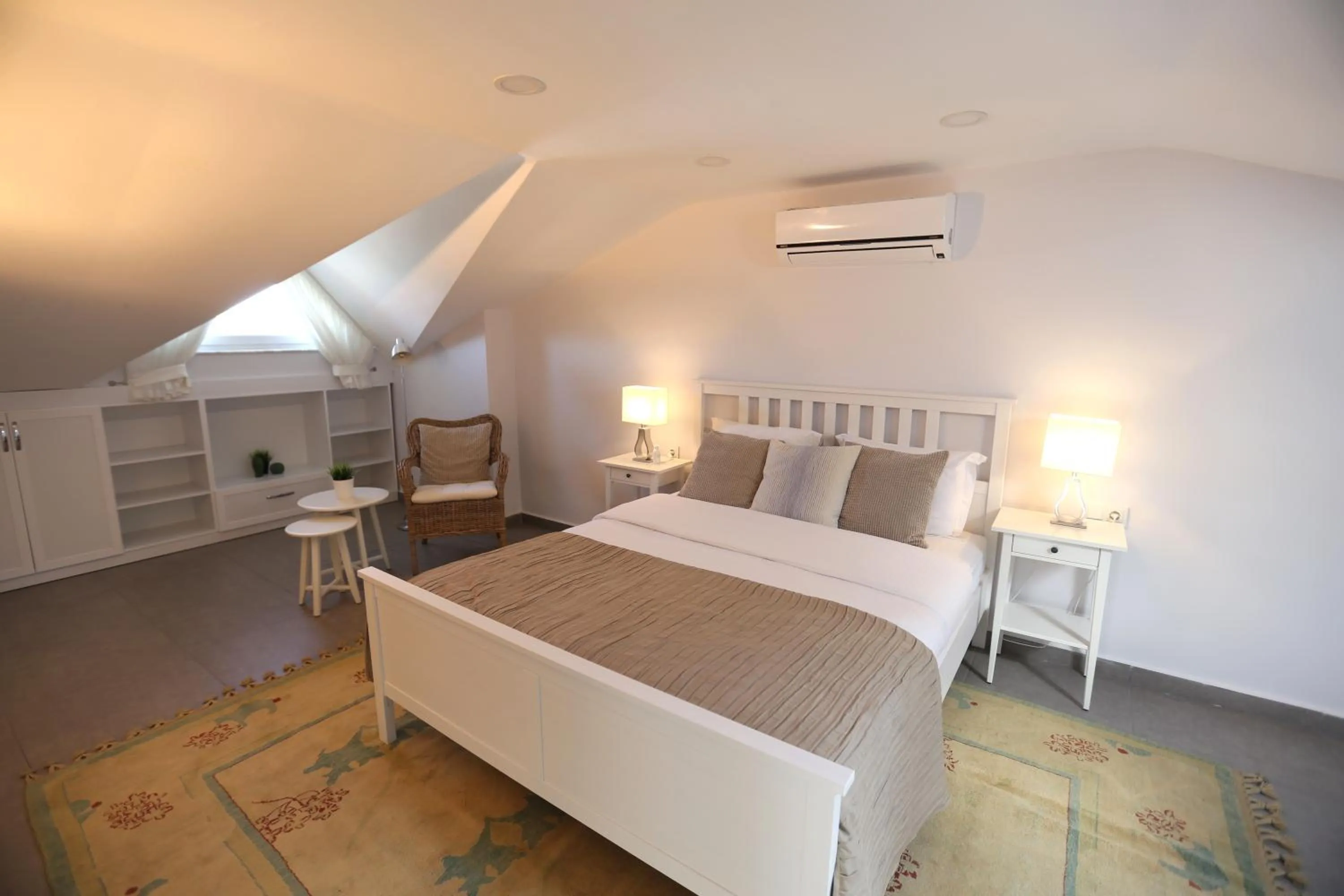 Bed in Truemar Hotels & Suites