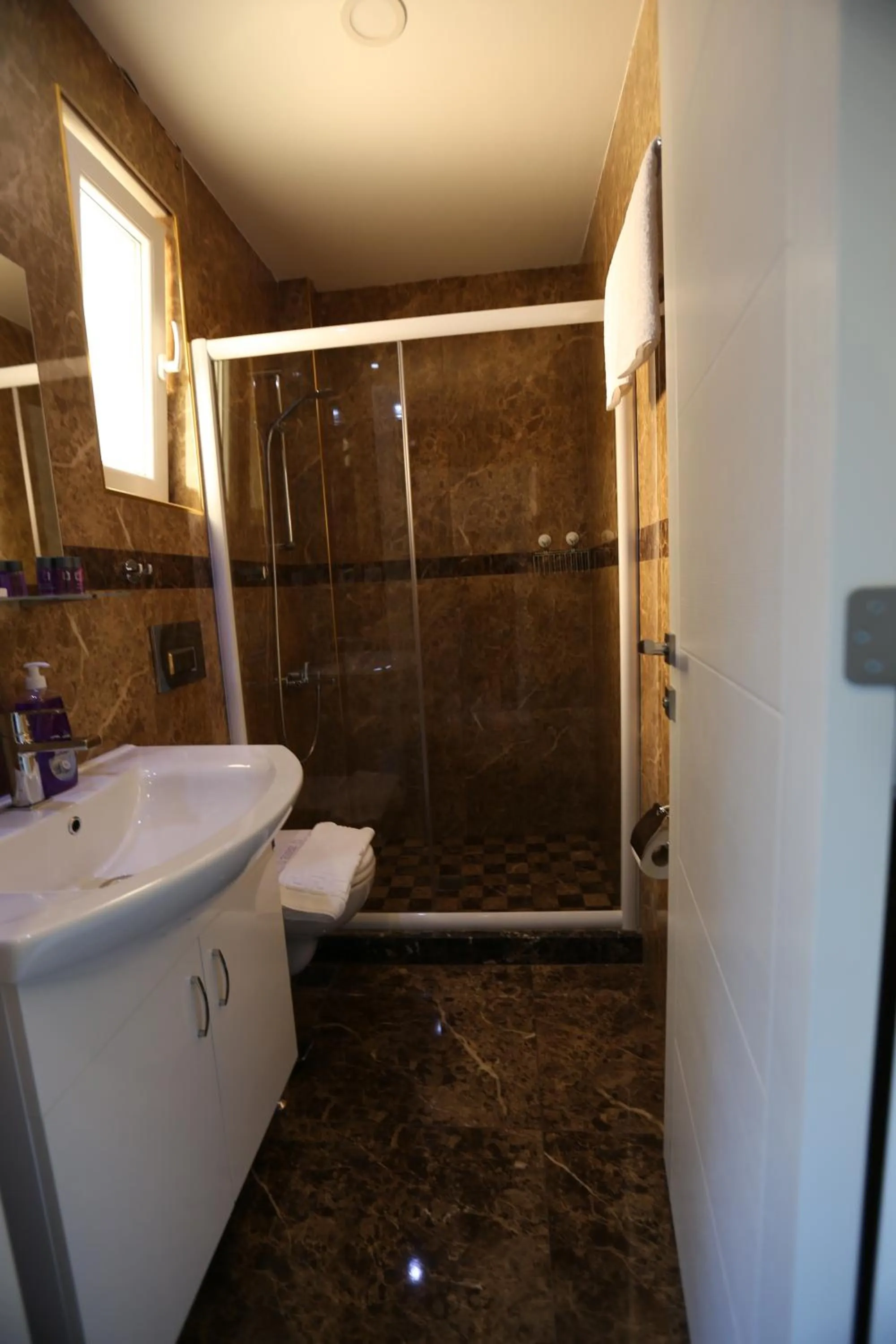 Shower in Truemar Hotels & Suites