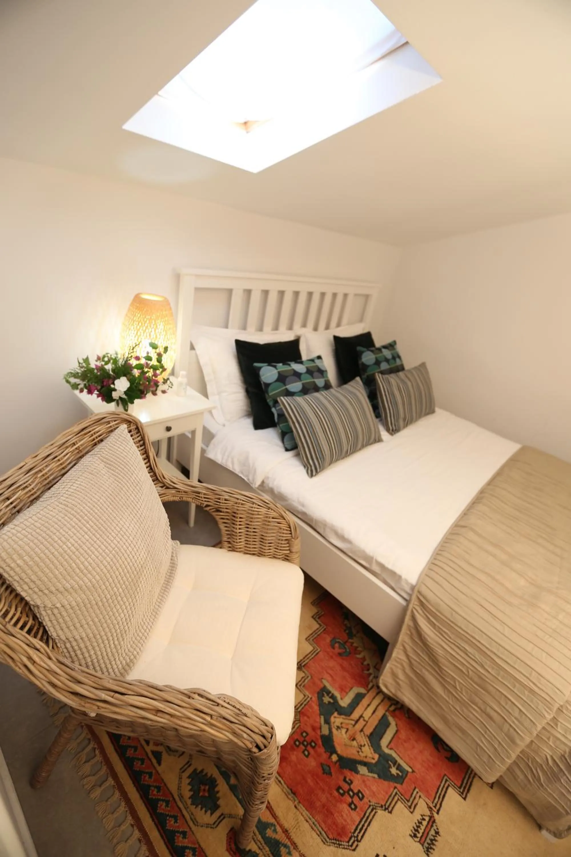 Bed in Truemar Hotels & Suites