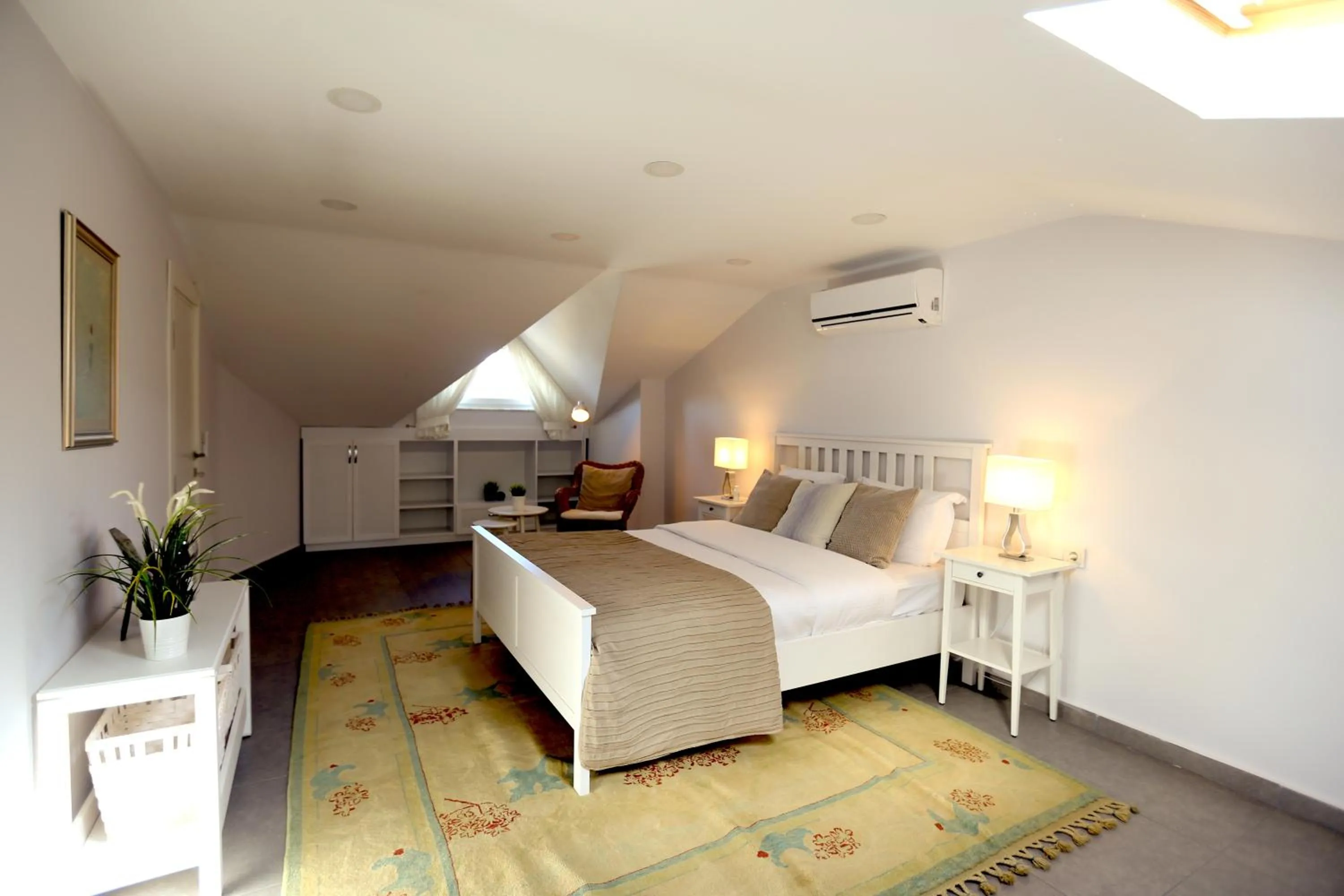 Bed in Truemar Hotels & Suites