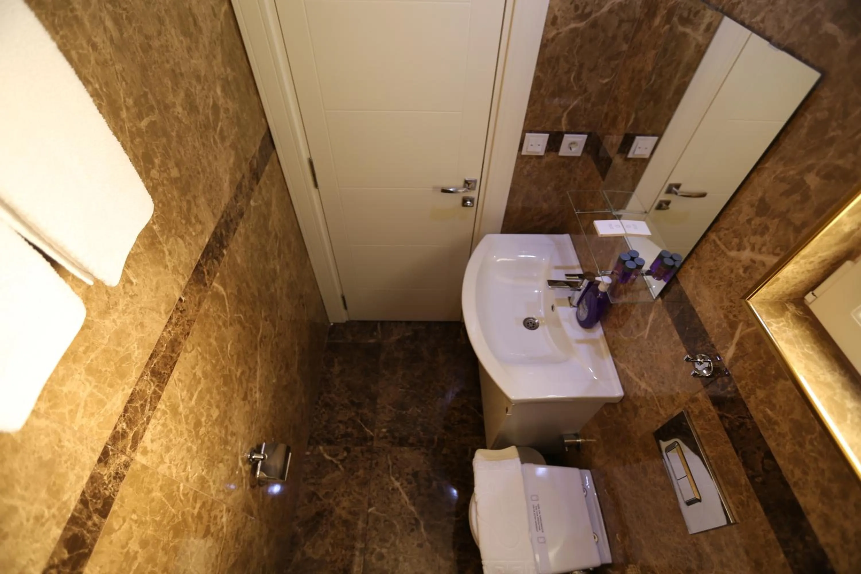 Toilet in Truemar Hotels & Suites