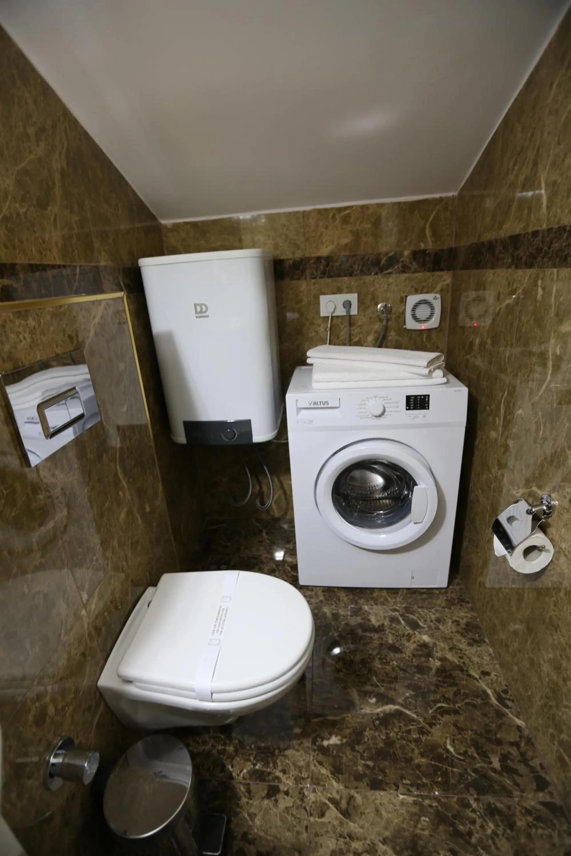 Toilet in Truemar Hotels & Suites