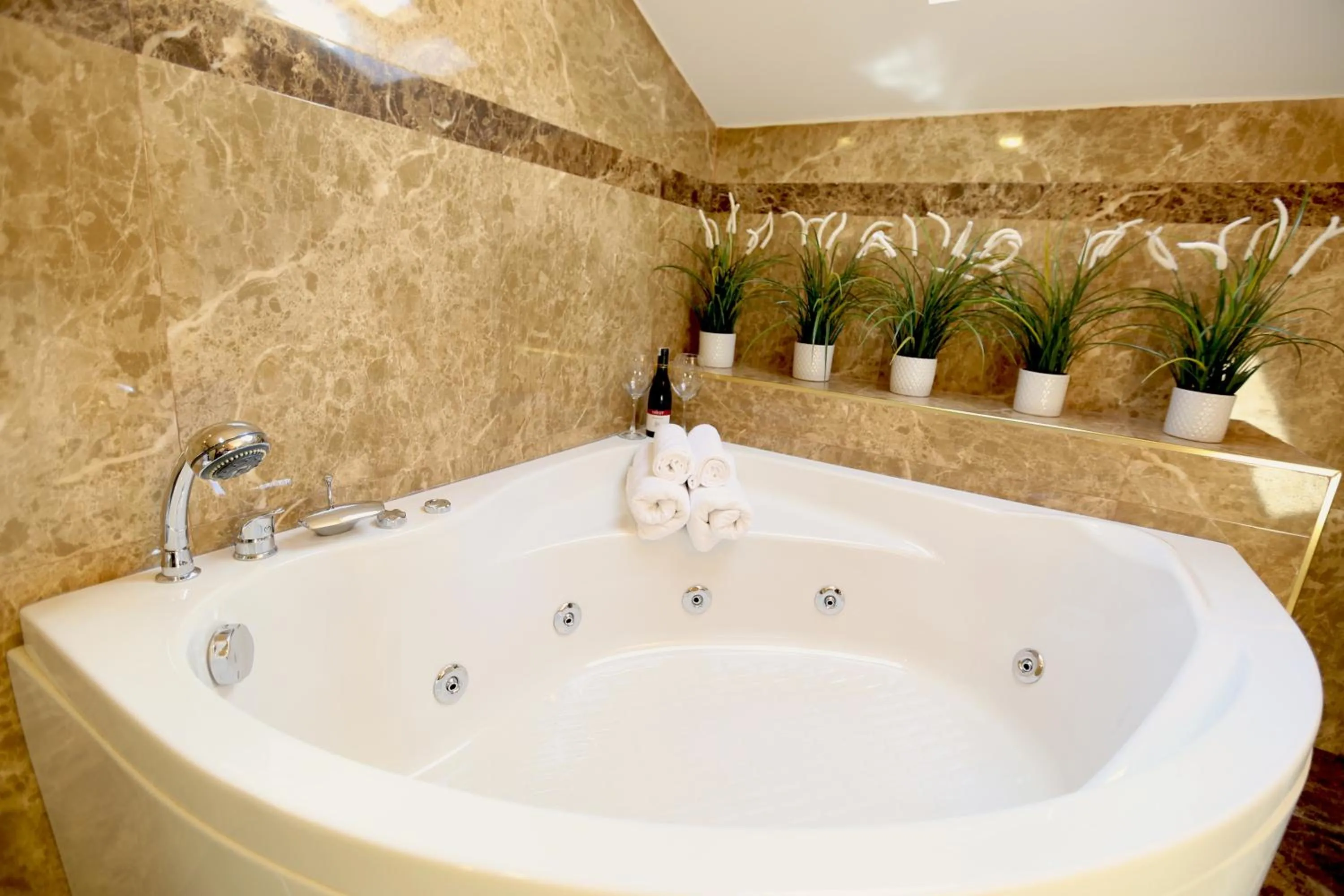 Bathroom in Truemar Hotels & Suites